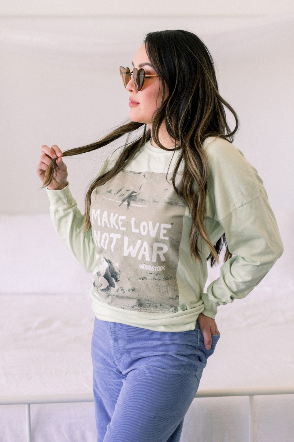 Woodstock Lover Long Sleeve shirt in Mint and Ivory colors, featuring a bold print with a message of love and peace.