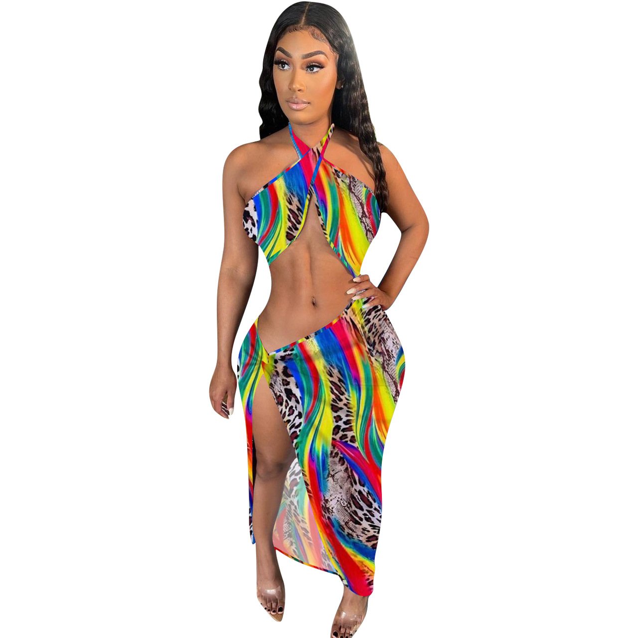 Women wearing a stylish irregular slit halter top with vibrant printed patterns, showcasing a navel-exposed design.