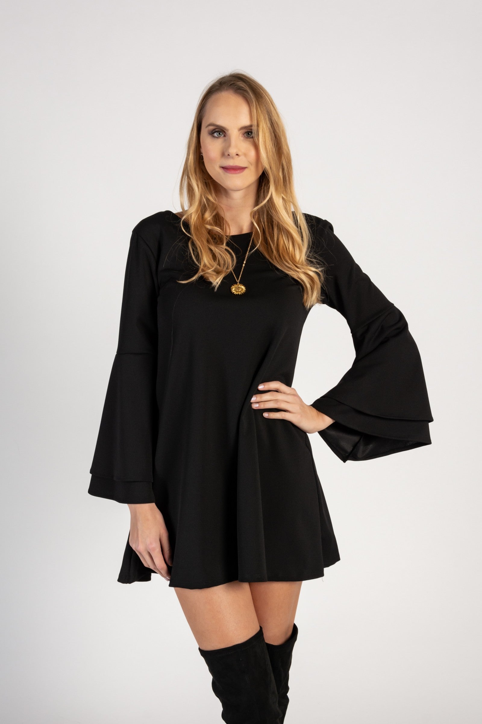 WOMEN DRESS RANIA in black featuring bell sleeves and unique back design, perfect for modern styling.