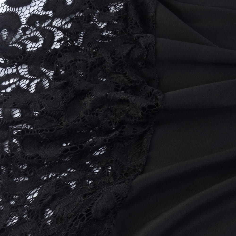 Black lace fabric close-up.