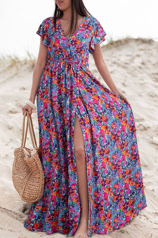 Women Floral Print V Neck Wrap Split Maxi Dress featuring a high waist, side slit, and short sleeves in a vibrant floral pattern.