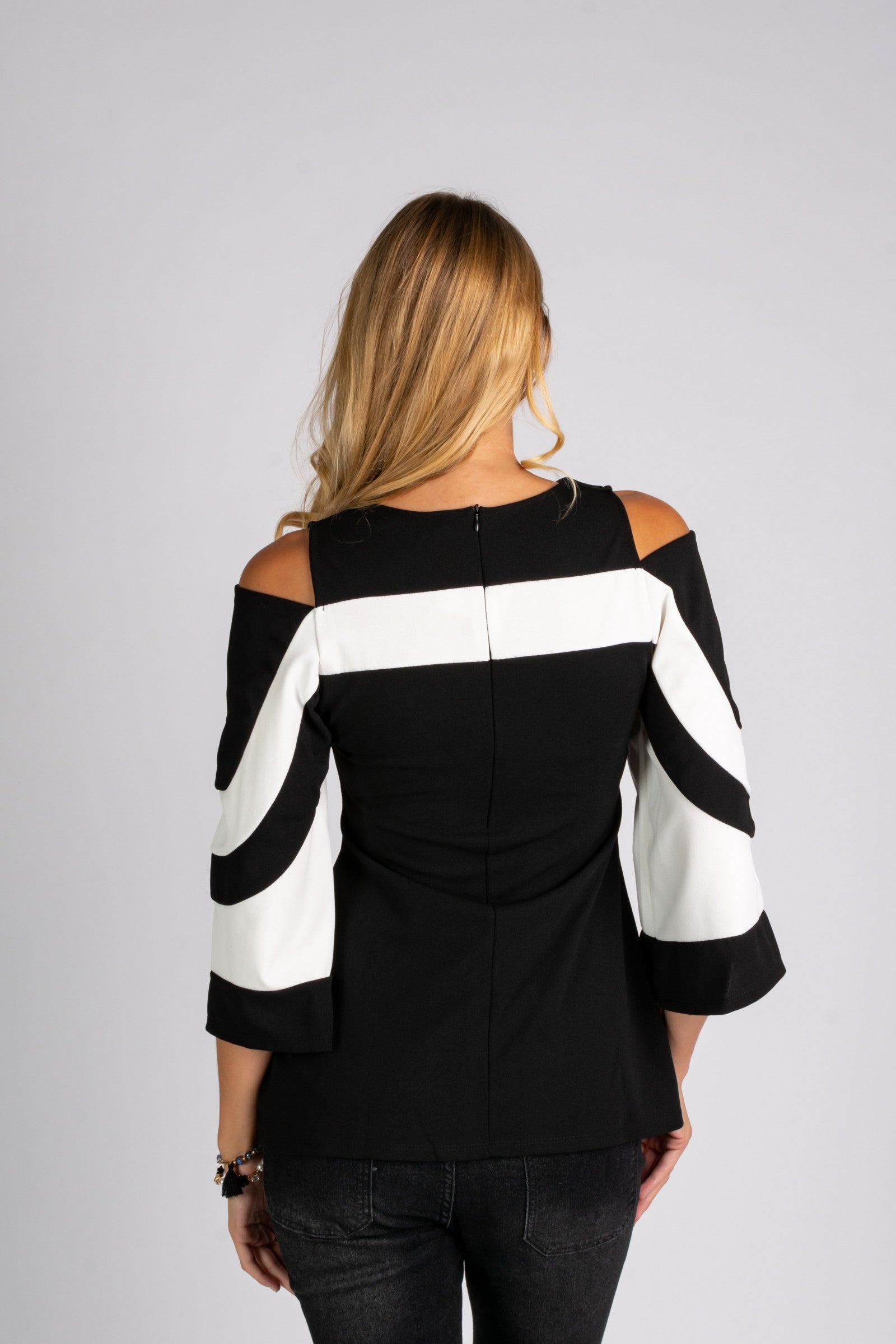 Elegant WOMEN SHIRT NINITA featuring a large collar, open shoulder, and 3/4 bell sleeves in black and white.