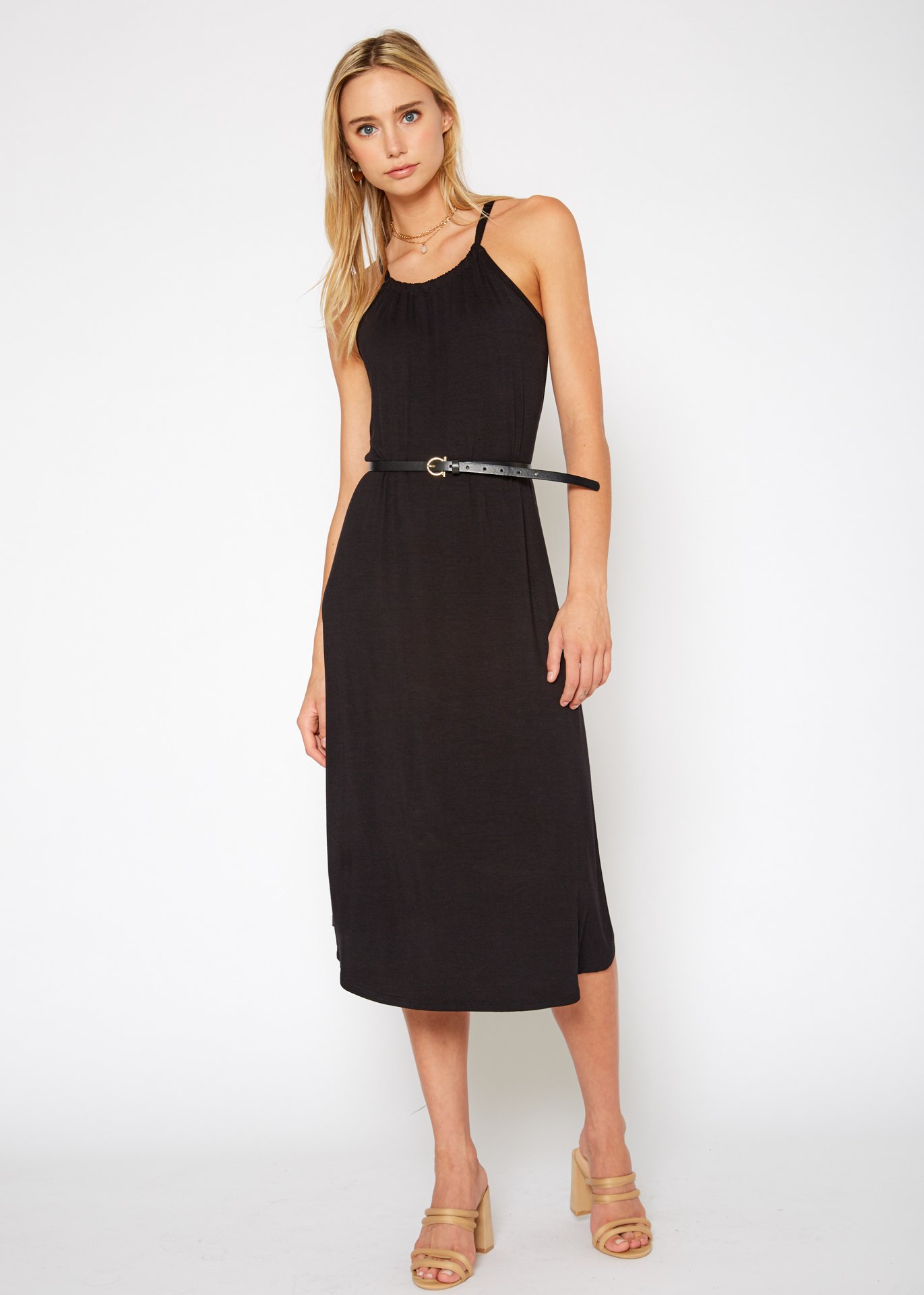 A stylish Women's Basic Haltered Dress featuring a halter neck design and rear neck tie, made from a soft rayon and spandex blend.