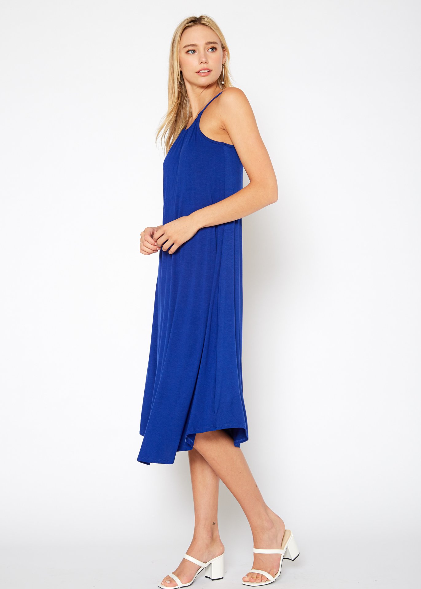 A stylish Women's Basic Haltered Dress featuring a halter neck design and rear neck tie, made from a soft rayon and spandex blend.