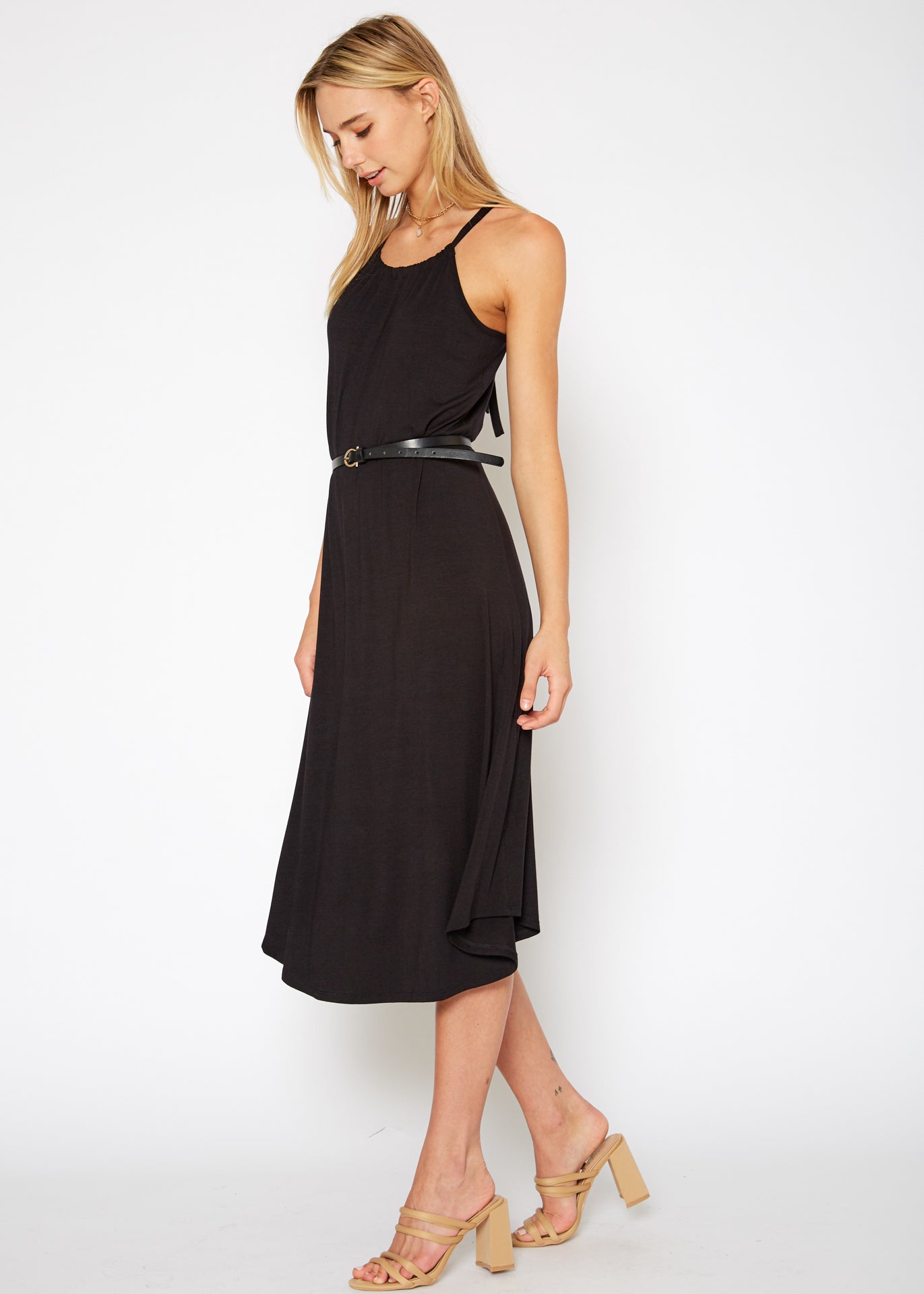 A stylish Women's Basic Haltered Dress featuring a halter neck design and rear neck tie, made from a soft rayon and spandex blend.