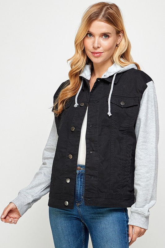 Women's denim jacket featuring a fleece hoodie, soft enzyme-washed fabric, and multiple pockets for a stylish and functional look.