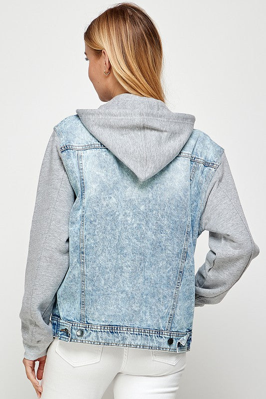 Women's denim jacket featuring a fleece hoodie, soft enzyme-washed fabric, and multiple pockets for a stylish and functional look.