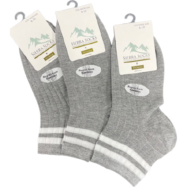 A pack of Women's Diabetic Arthritic Rayon and Bamboo Crew Socks in assorted colors, showcasing their soft texture and non-binding top design.