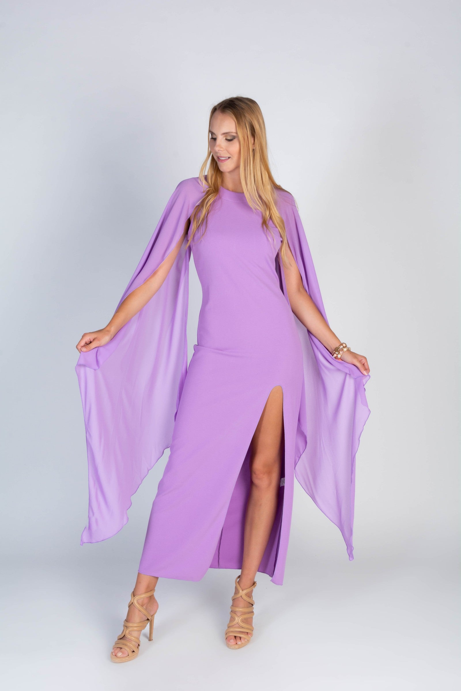 Elegant Women's Dress Ileana in lilac with round collar and side cutout design, showcasing soft fabric and hidden back zipper.