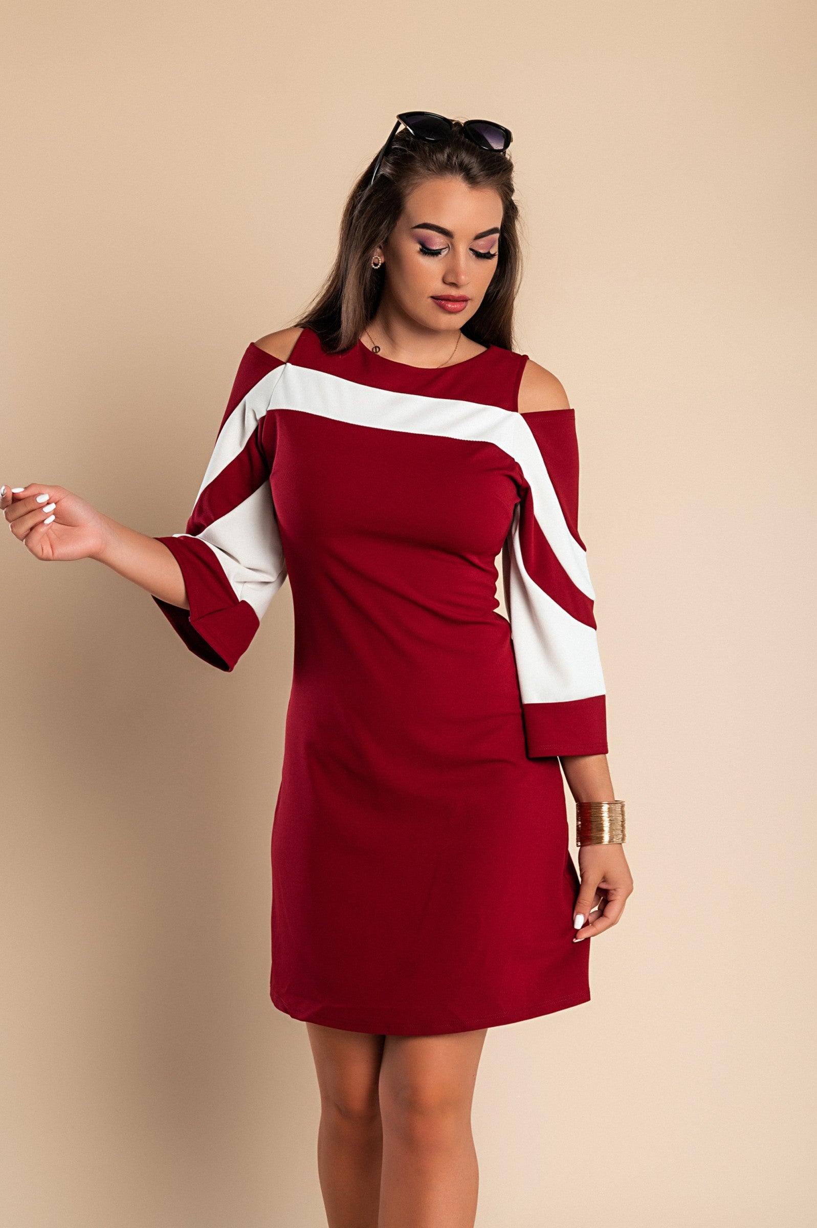 Elegant women's dress in Bordo with 3/4 bell sleeves and mid-thigh length, featuring a back zipper.