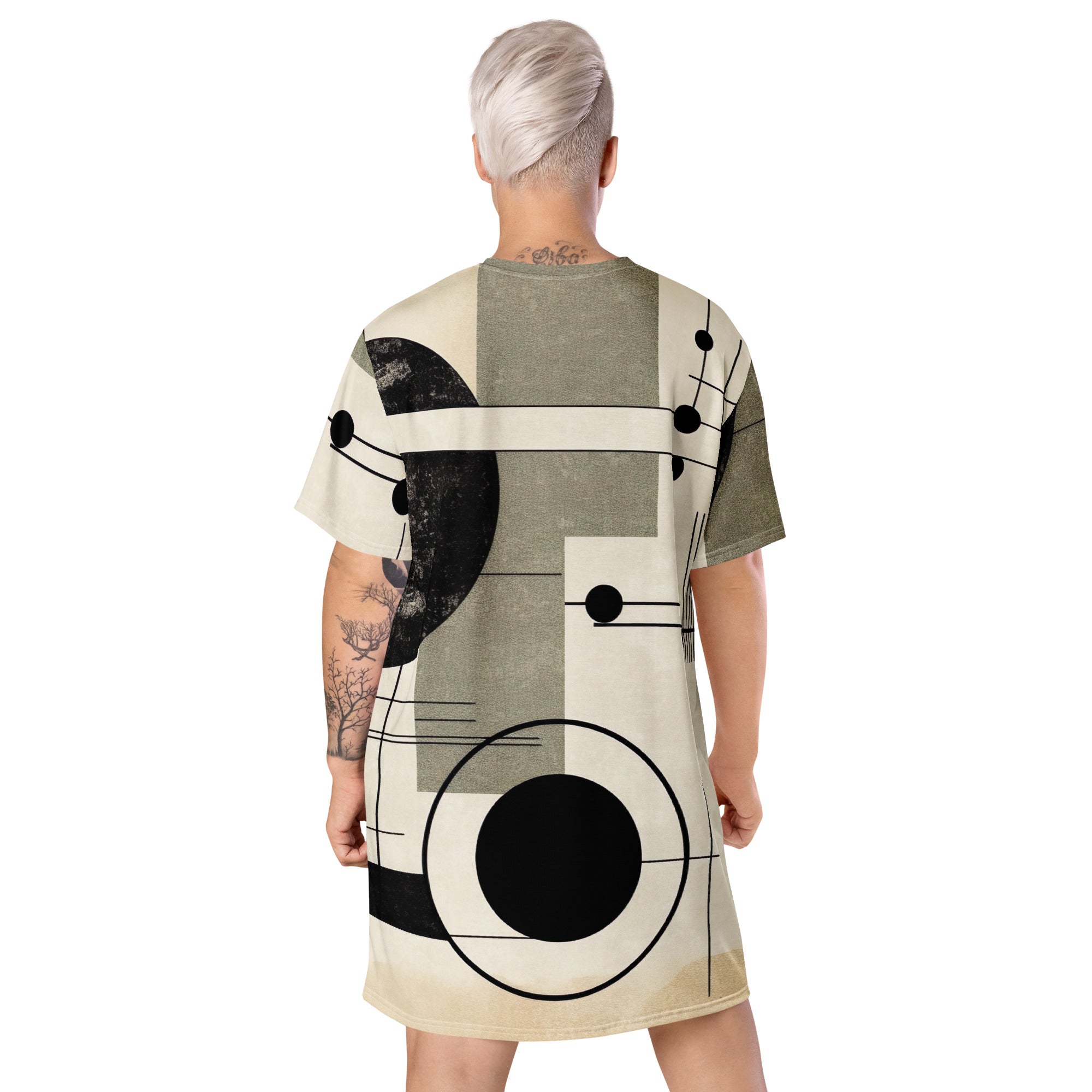 Womens Graphic T-shirt Dress featuring abstract black, beige, and brown geometric shapes, showcasing its oversized fit and stylish design.