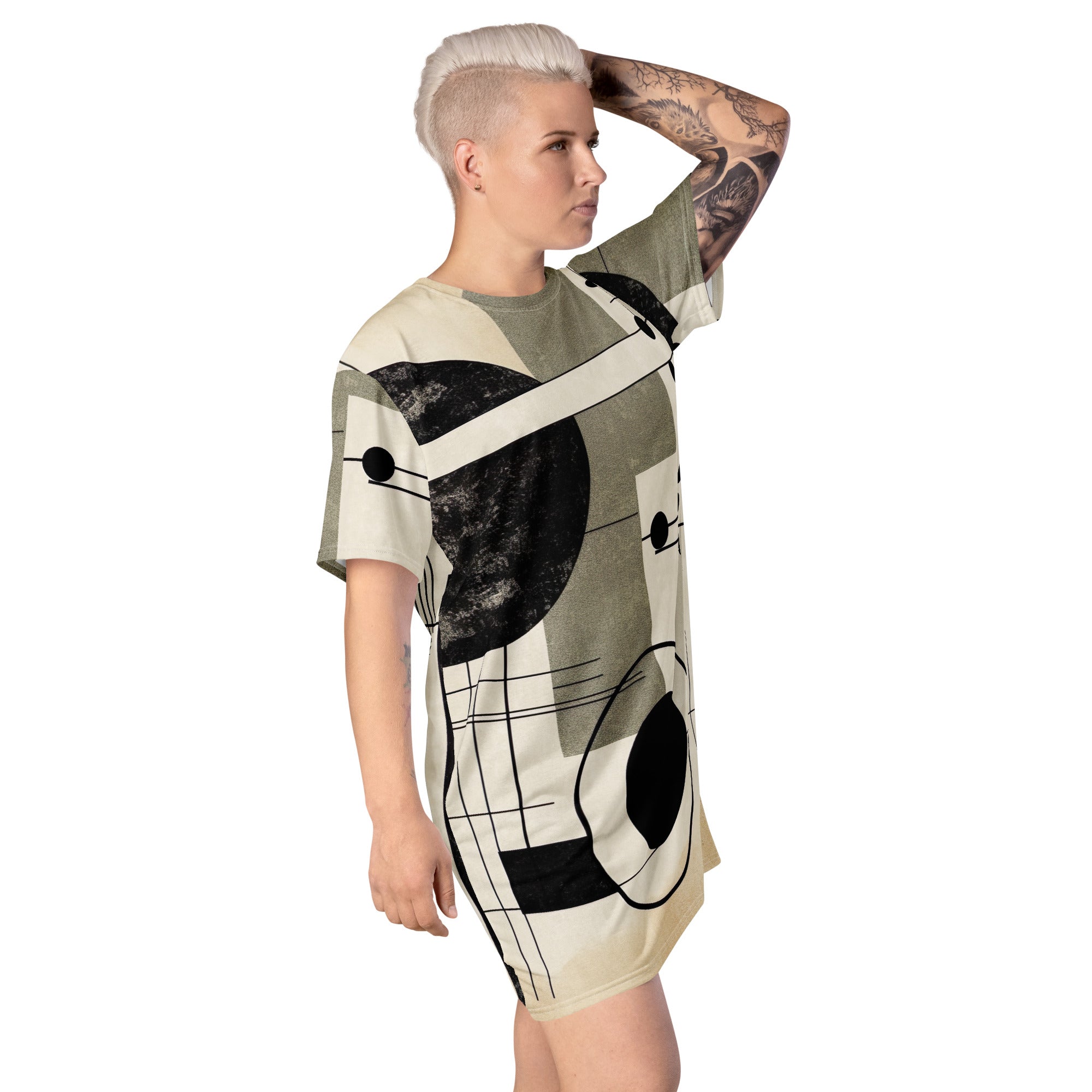 Womens Graphic T-shirt Dress featuring abstract black, beige, and brown geometric shapes, showcasing its oversized fit and stylish design.