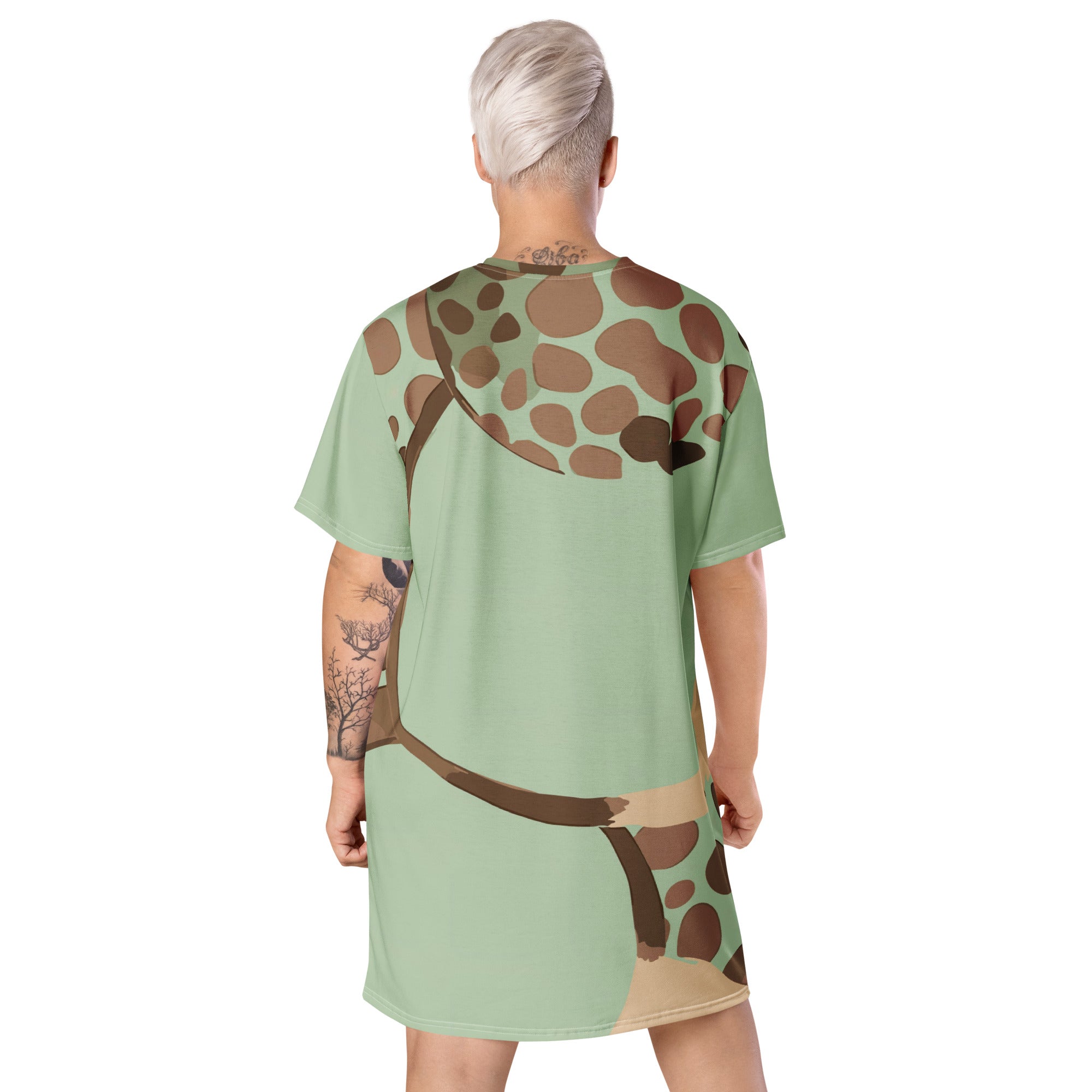 Womens Graphic T-shirt Dress featuring a mint green and brown spotted print, showcasing its oversized fit and stylish design.