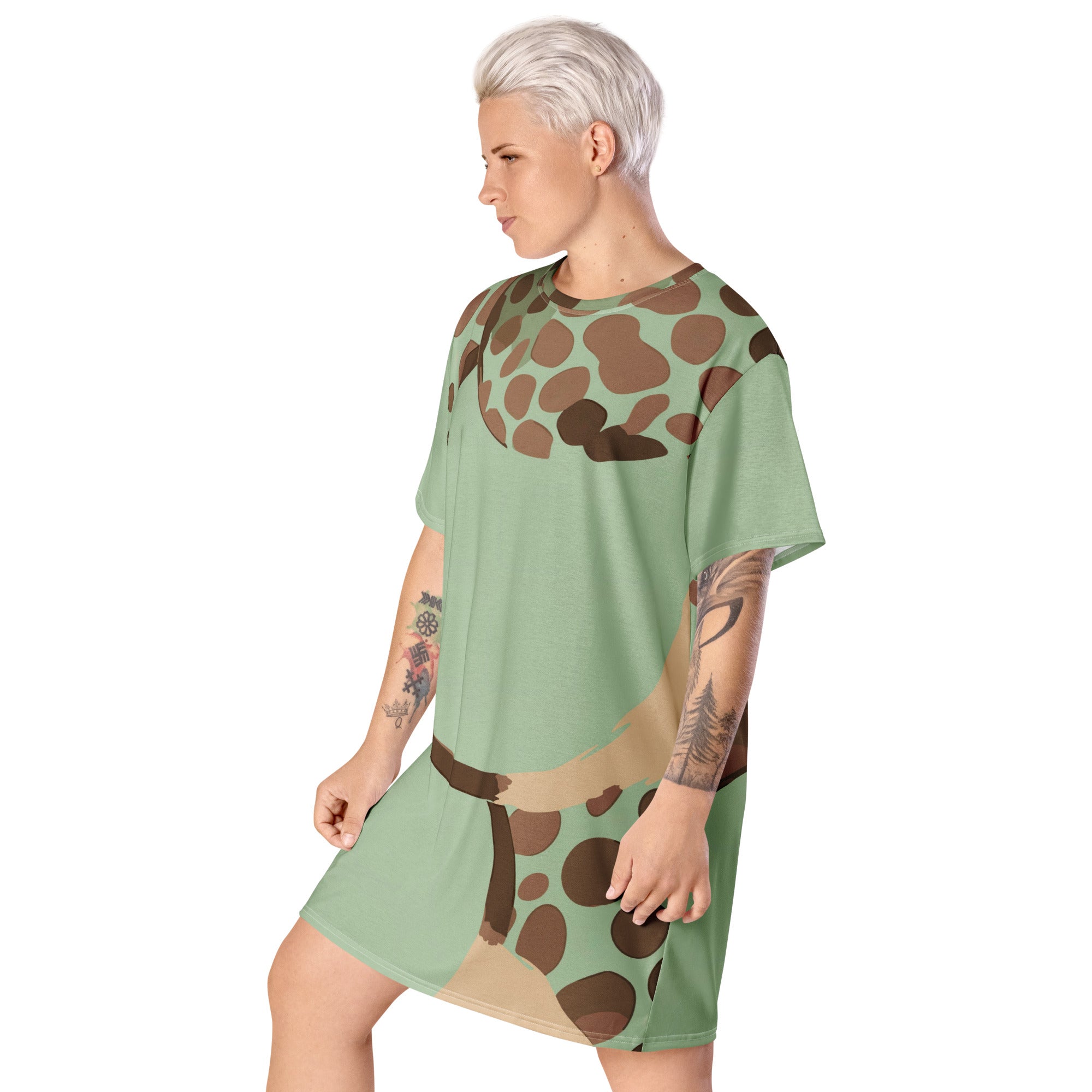 Womens Graphic T-shirt Dress featuring a mint green and brown spotted print, showcasing its oversized fit and stylish design.