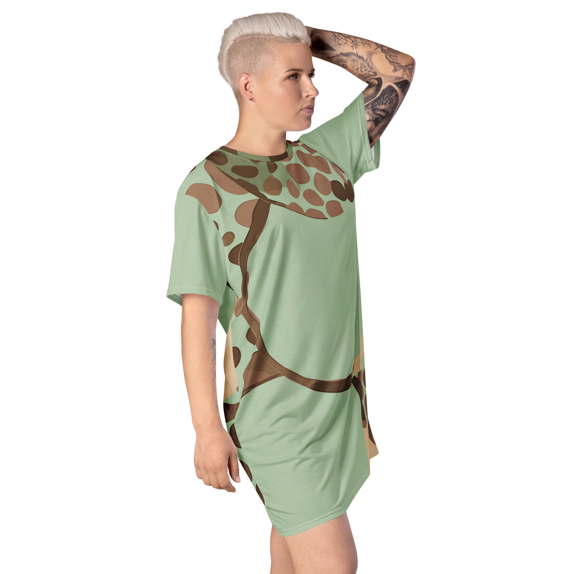 Womens Graphic T-shirt Dress featuring a mint green and brown spotted print, showcasing its oversized fit and stylish design.