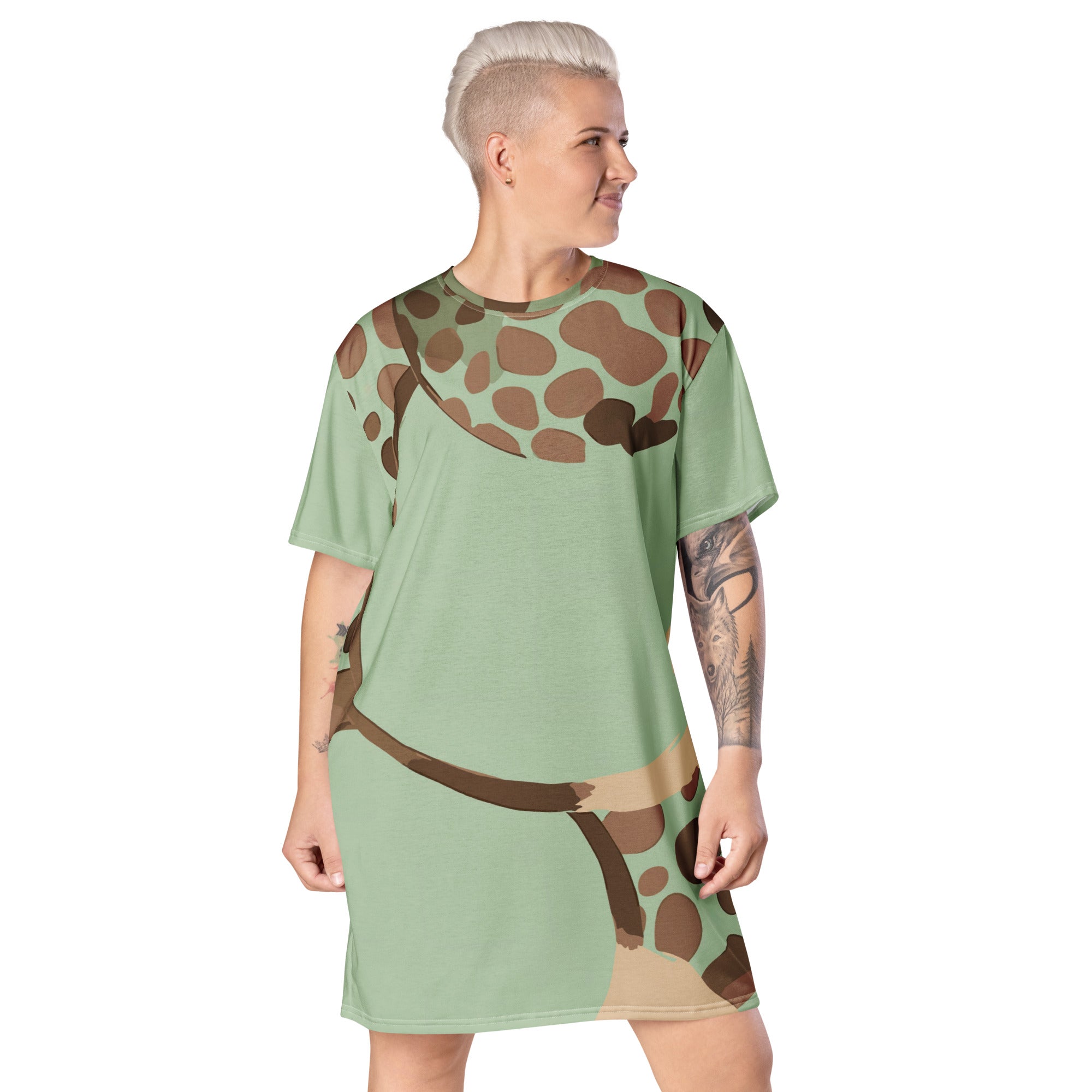 Womens Graphic T-shirt Dress featuring a mint green and brown spotted print, showcasing its oversized fit and stylish design.