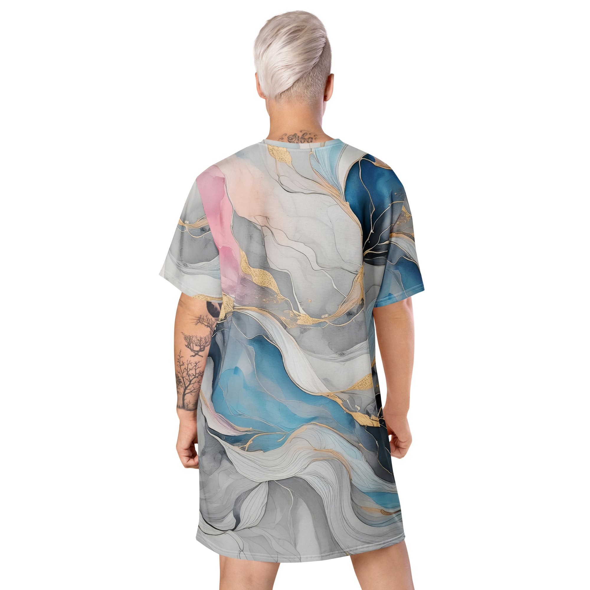 Womens Graphic T-shirt Dress featuring a Marble Cloud design in Grey, Pink, and Blue, showcasing its oversized fit and stylish look.