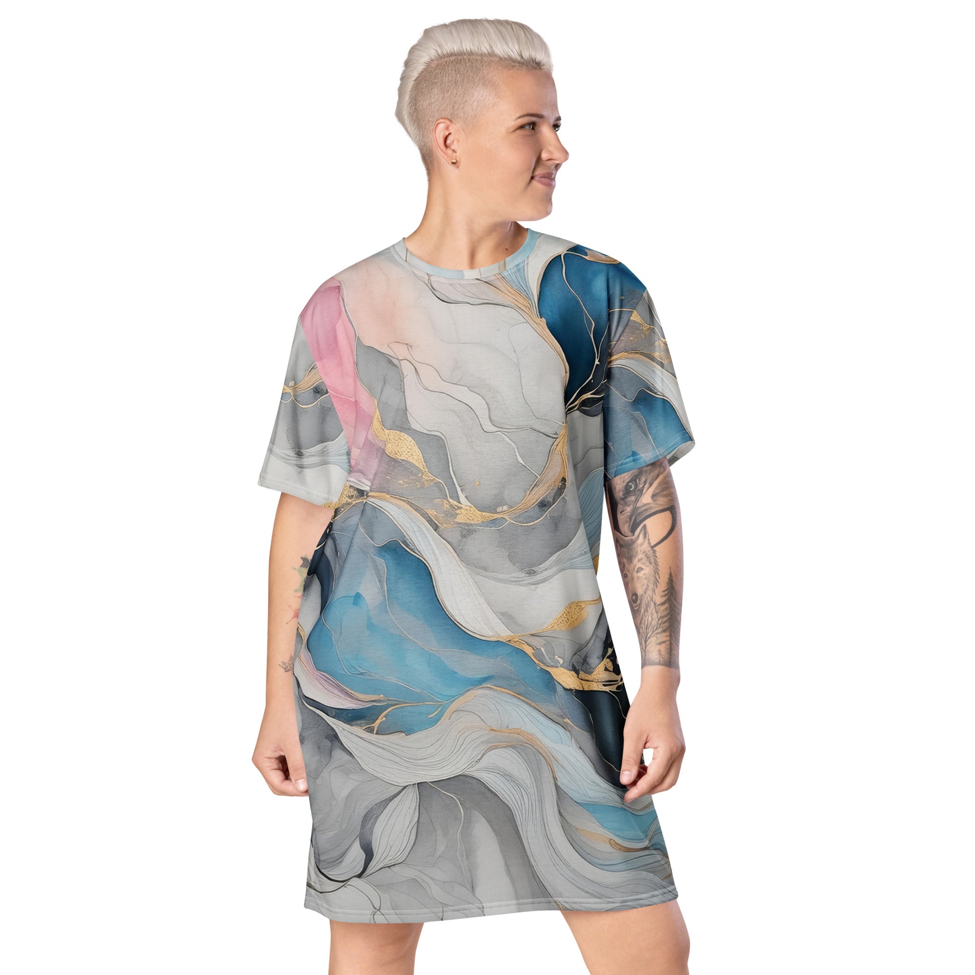 Womens Graphic T-shirt Dress featuring a Marble Cloud design in Grey, Pink, and Blue, showcasing its oversized fit and stylish look.