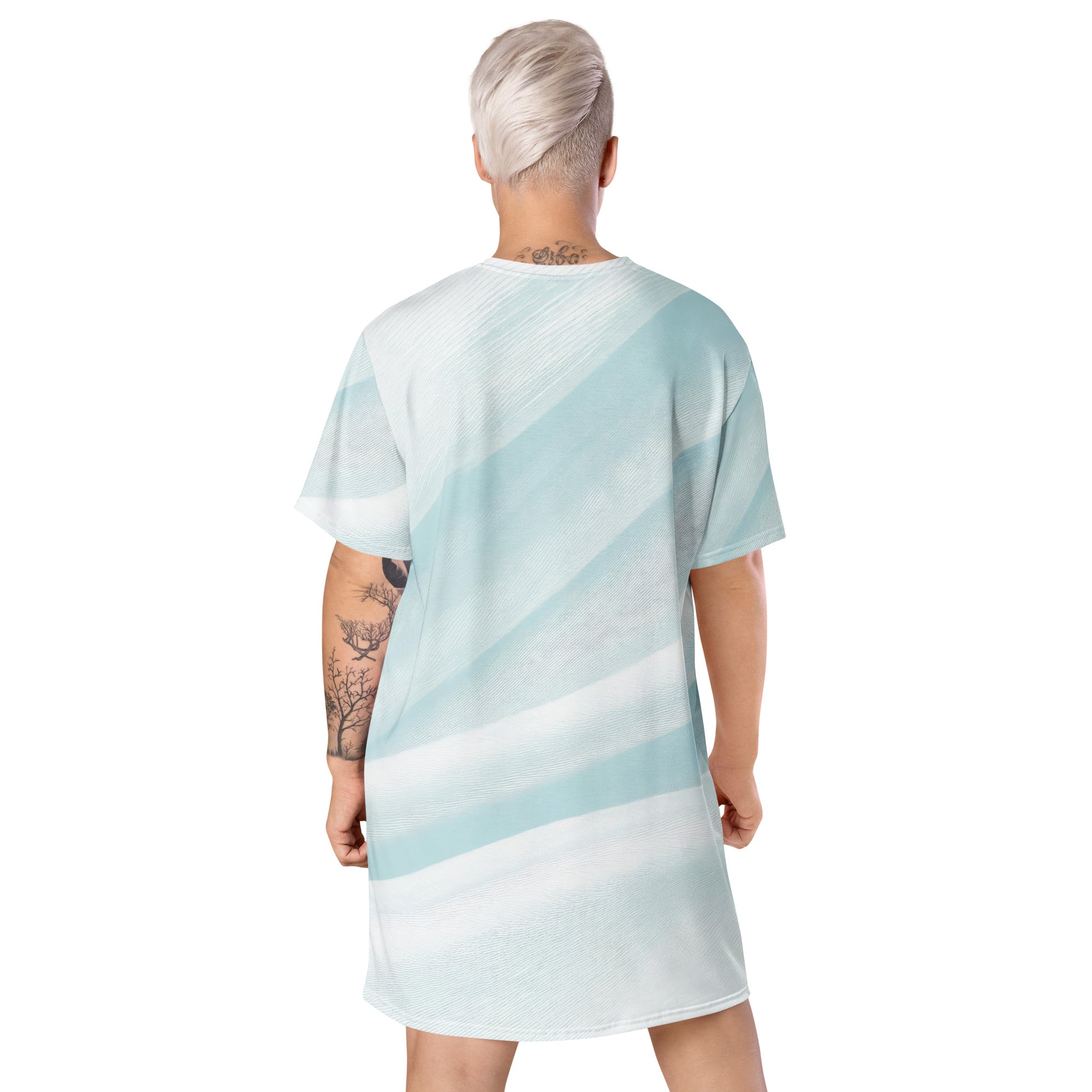 Womens Graphic T-shirt Dress featuring a pastel blue swirl pattern, showcasing its oversized fit and stylish design.