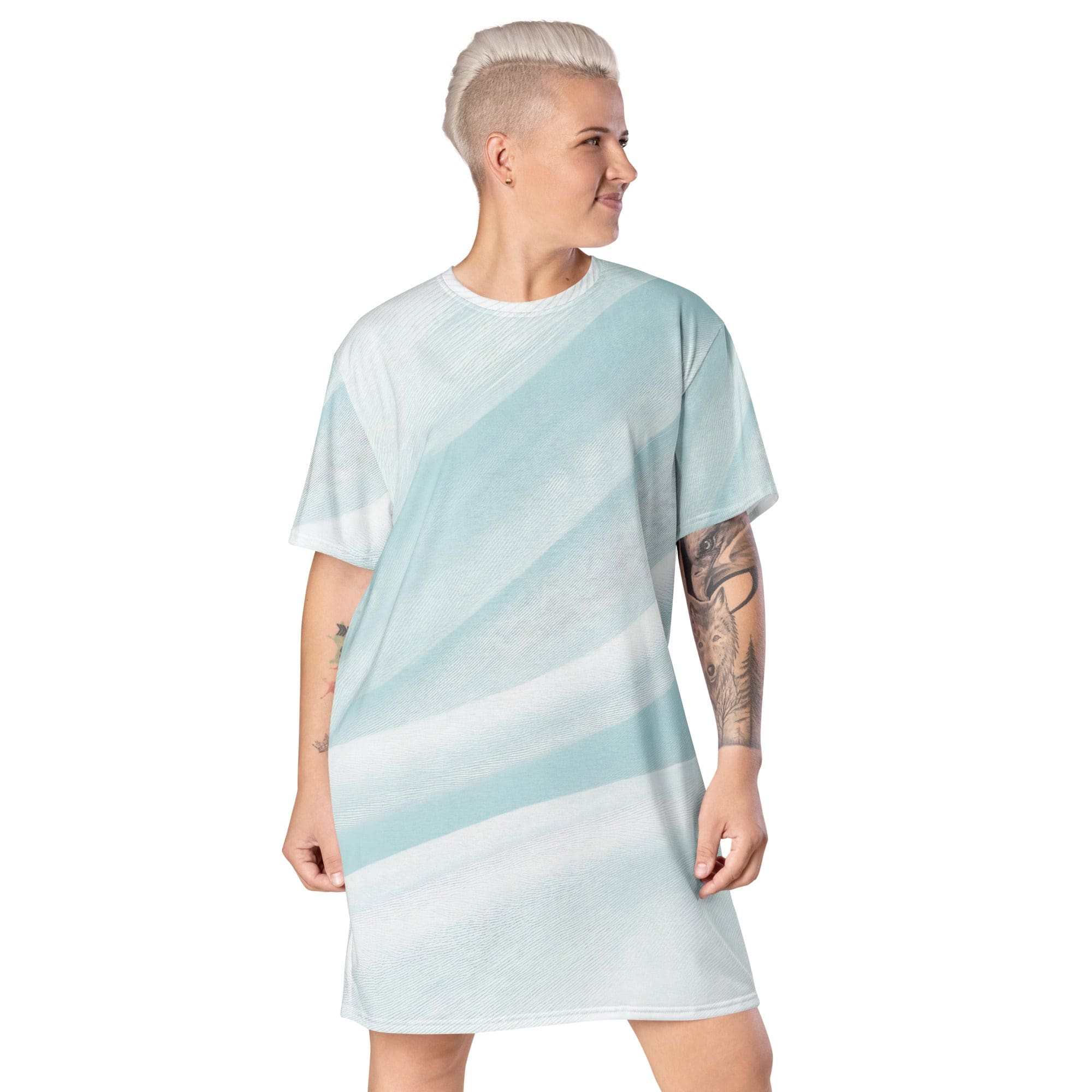 Womens Graphic T-shirt Dress featuring a pastel blue swirl pattern, showcasing its oversized fit and stylish design.