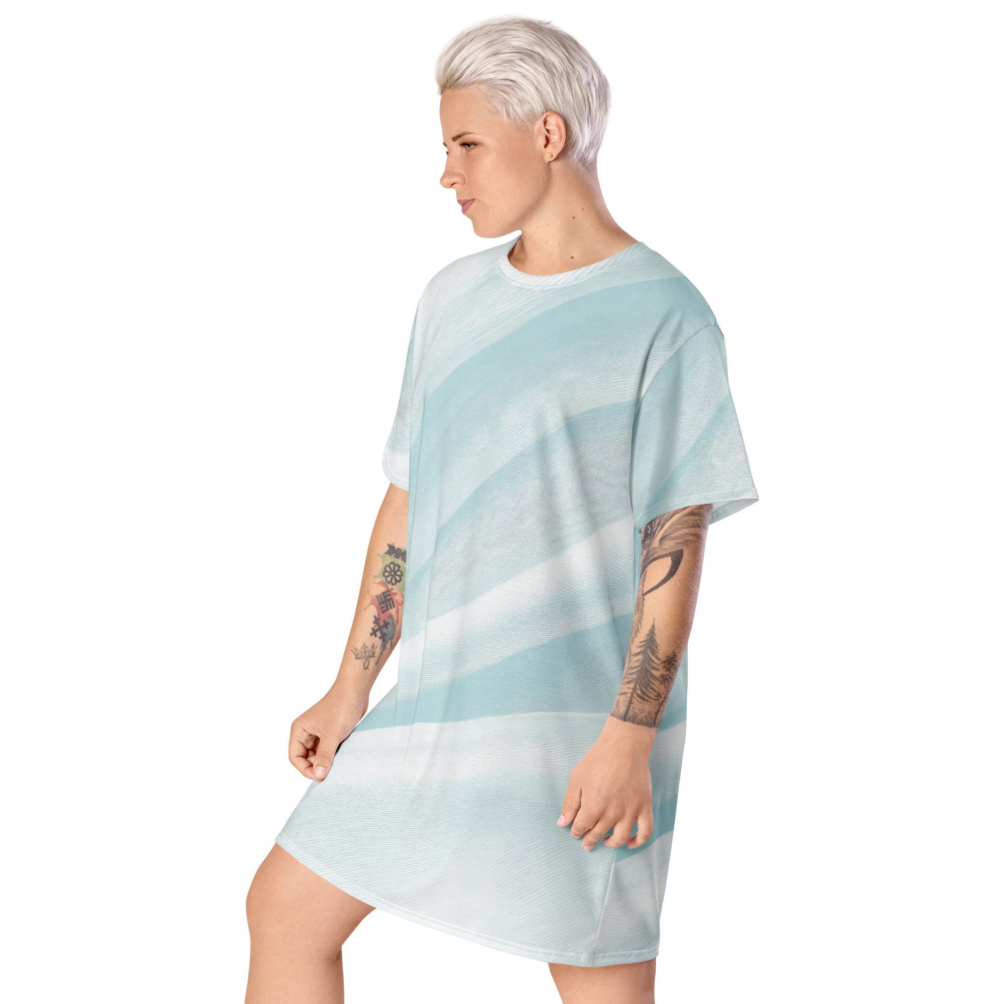 Womens Graphic T-shirt Dress featuring a pastel blue swirl pattern, showcasing its oversized fit and stylish design.