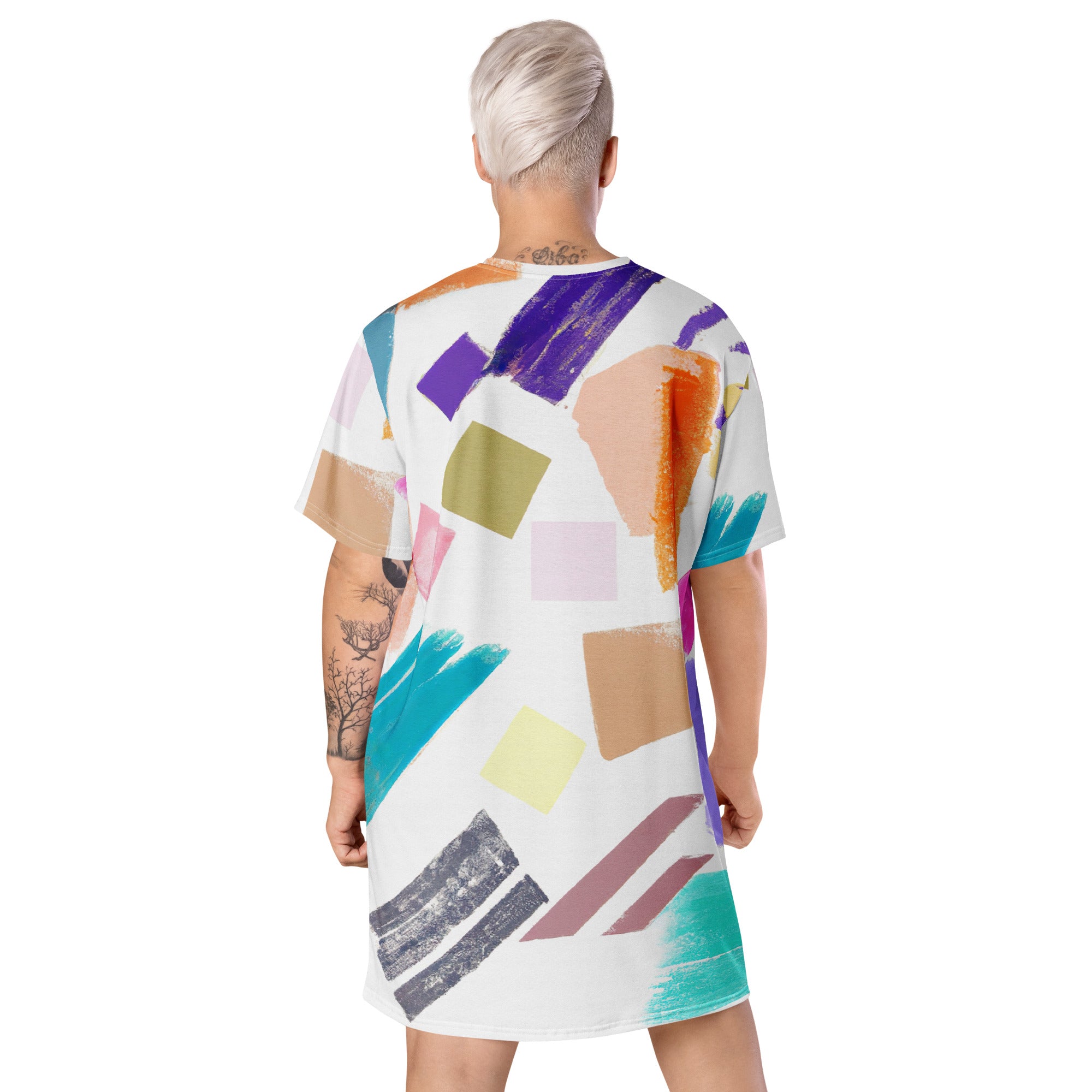 Womens Graphic T-shirt Dress featuring a pastel pattern, showcasing its comfortable oversized fit and stylish design.