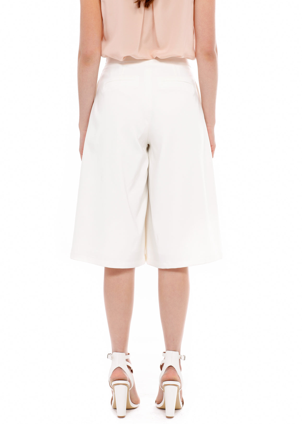 Women's High Rise Overlay Culottes featuring a skirt impression overlay and side pockets, made from high stretch twill fabric.