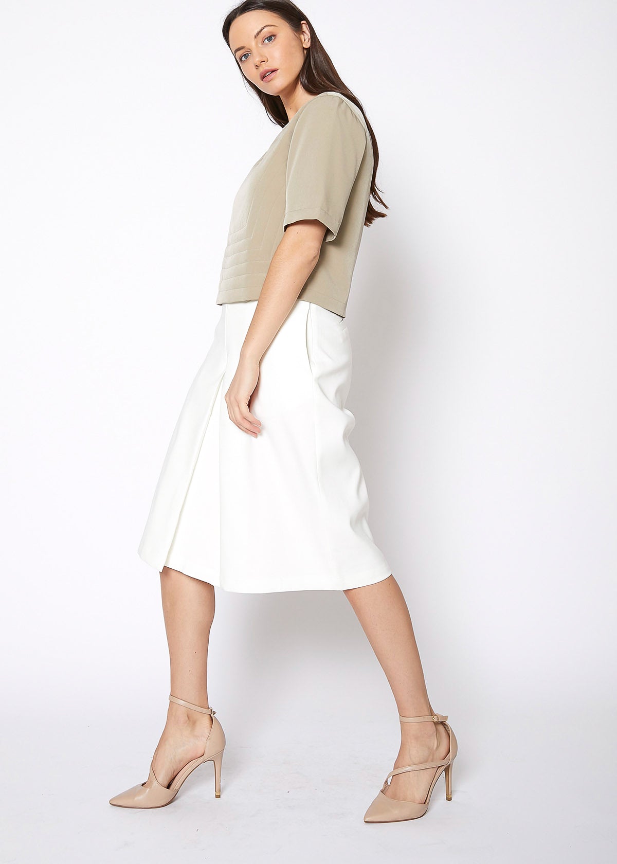 Women's High Rise Overlay Culottes featuring a skirt impression overlay and side pockets, made from high stretch twill fabric.