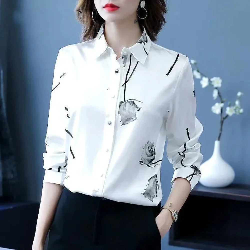 Women's Korean Theme Floral Shirt featuring a delicate floral pattern, classic collar, and button-down front, available in white and black.