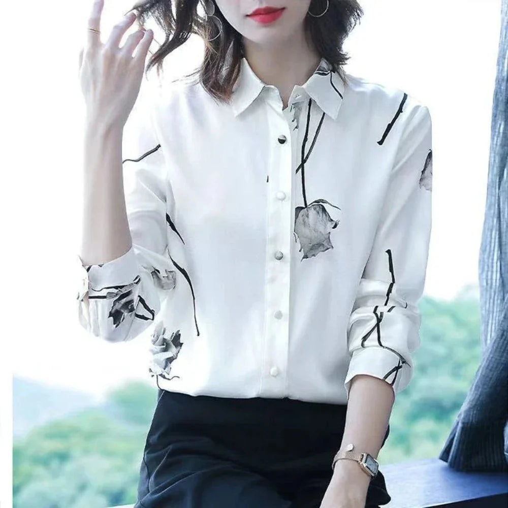 Women's Korean Theme Floral Shirt featuring a delicate floral pattern, classic collar, and button-down front, available in white and black.