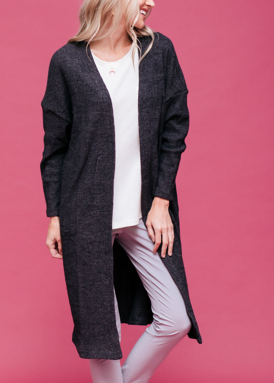 A stylish Women's Long Duster Cardigan featuring an open front design, made from a soft fabric blend, perfect for layering.