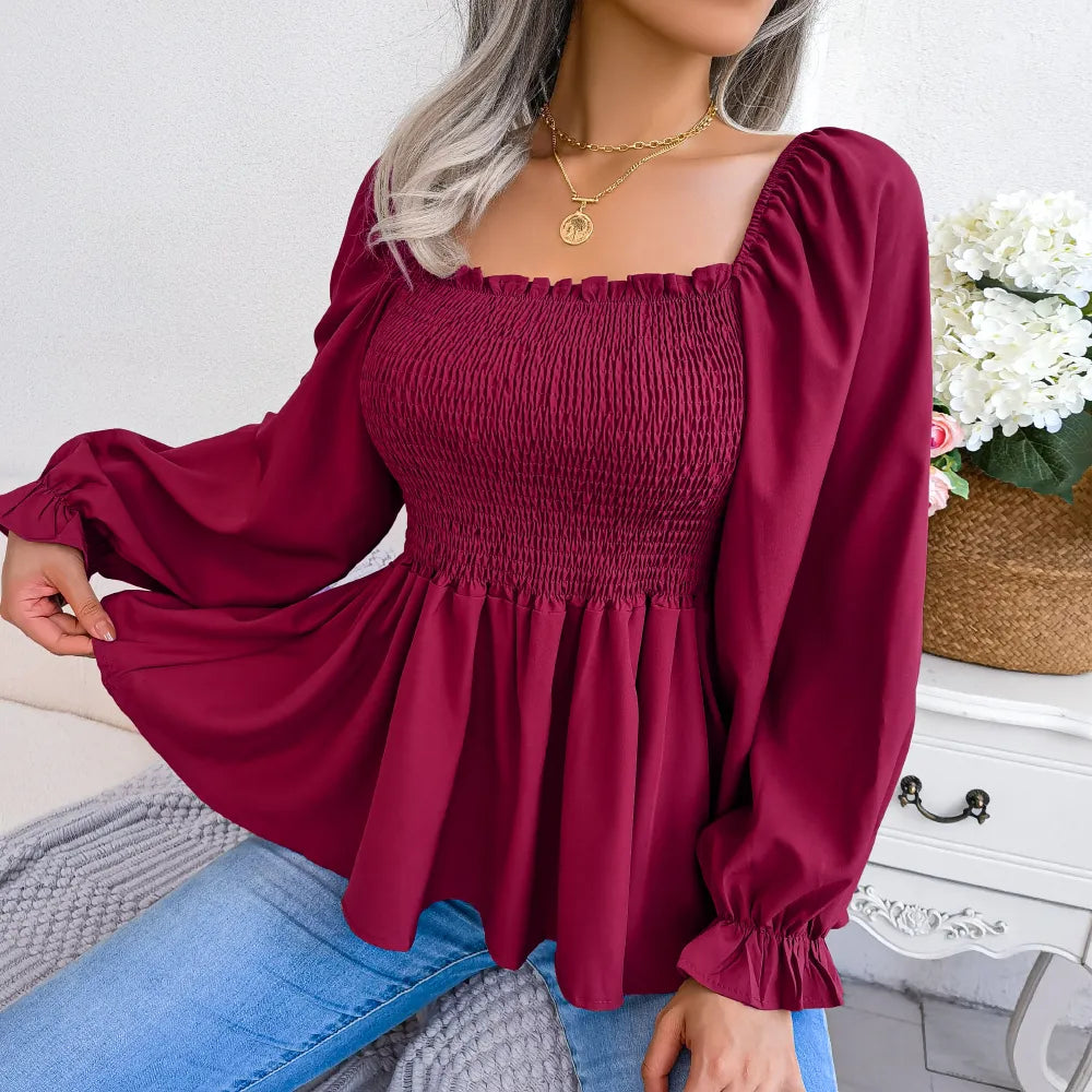 A stylish Women's Loose Fit Chiffon Blouse in various colors, showcasing its elegant design and billowy sleeves.