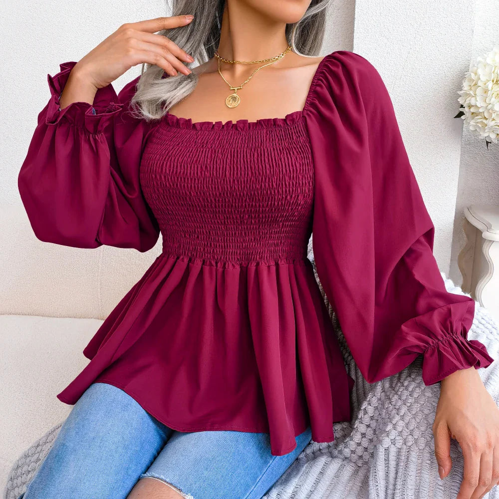 A stylish Women's Loose Fit Chiffon Blouse in various colors, showcasing its elegant design and billowy sleeves.