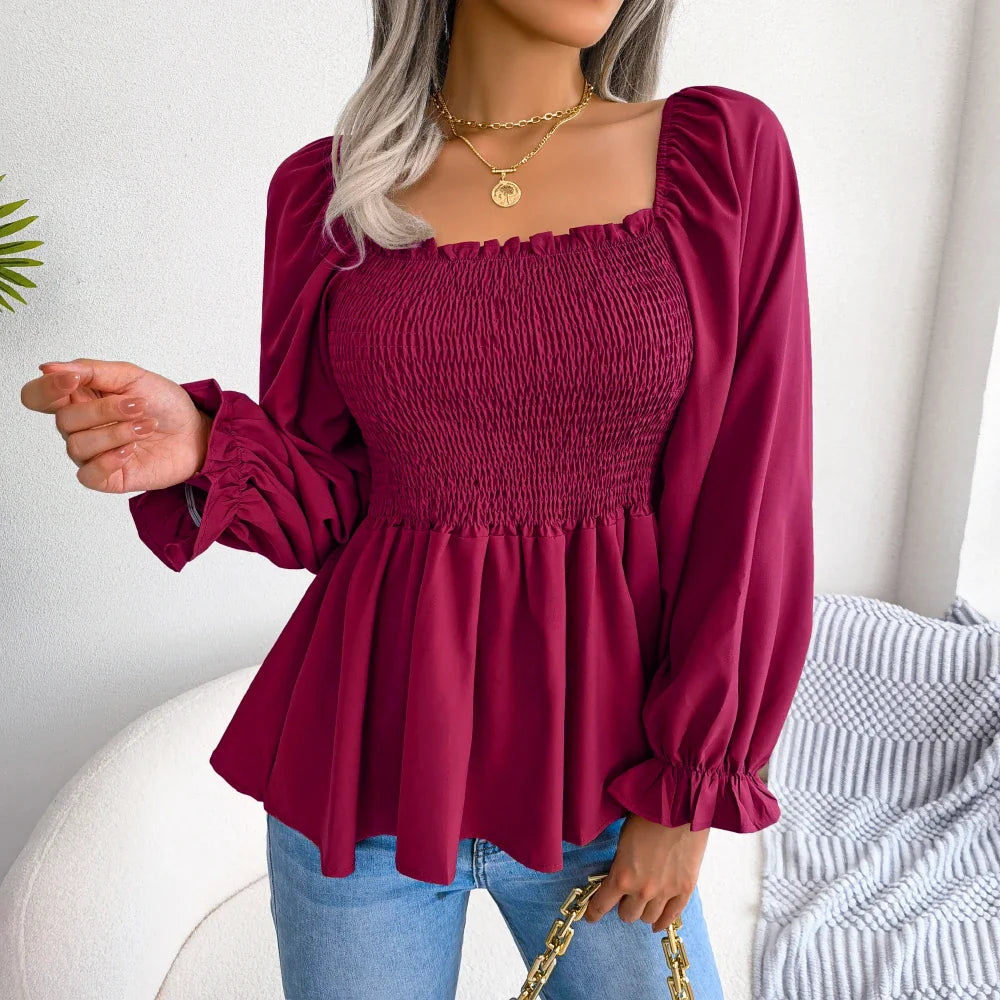 A stylish Women's Loose Fit Chiffon Blouse in various colors, showcasing its elegant design and billowy sleeves.