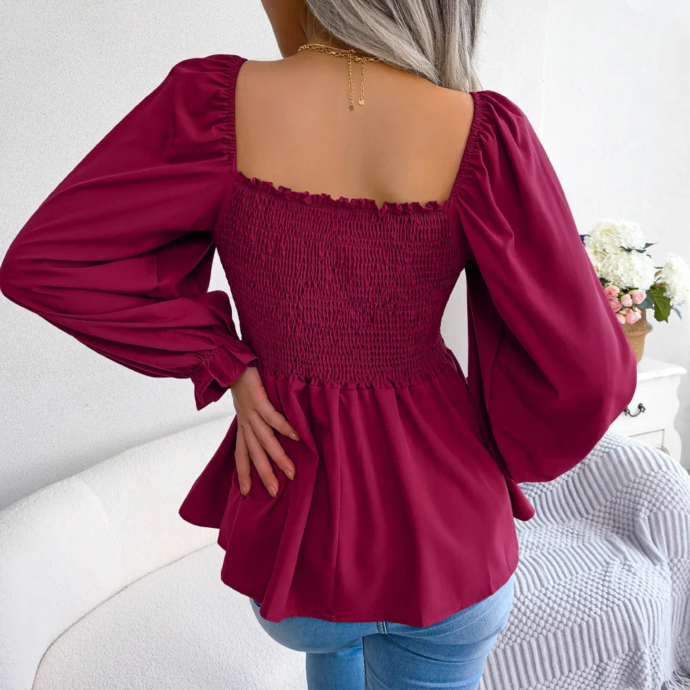 A stylish Women's Loose Fit Chiffon Blouse in various colors, showcasing its elegant design and billowy sleeves.