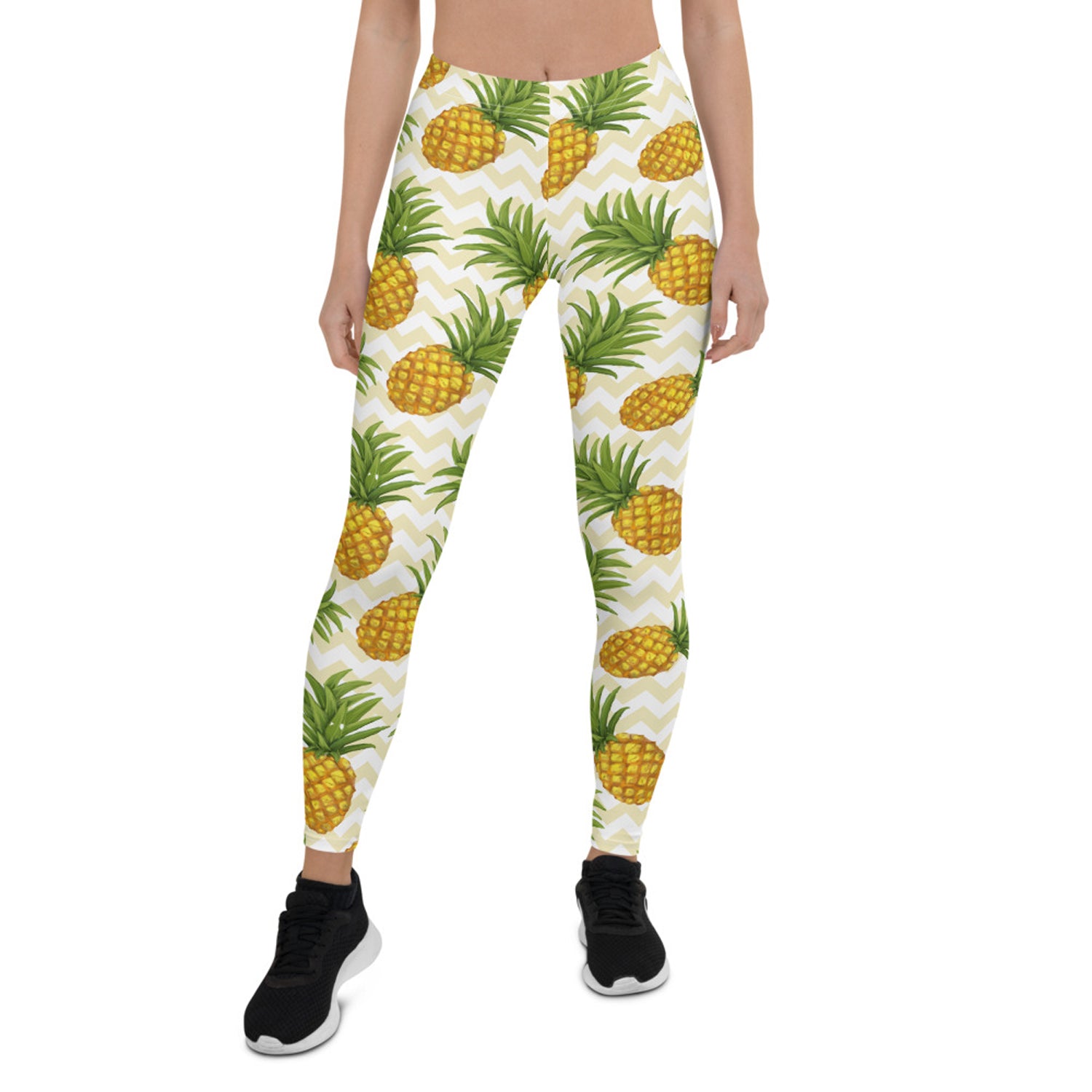 A pair of vibrant women's pineapple leggings featuring a unique graphic design, perfect for workouts and casual wear.