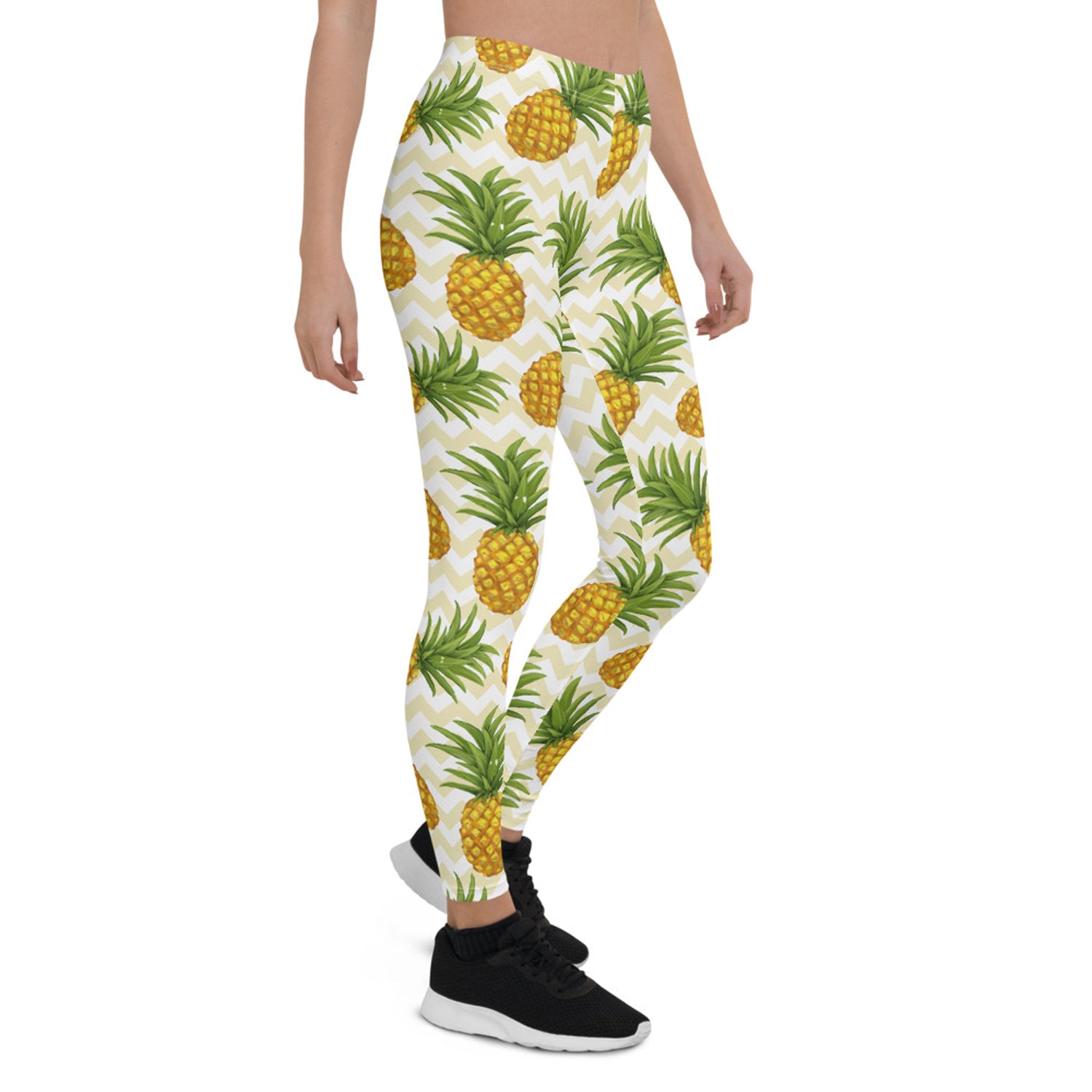 A pair of vibrant women's pineapple leggings featuring a unique graphic design, perfect for workouts and casual wear.