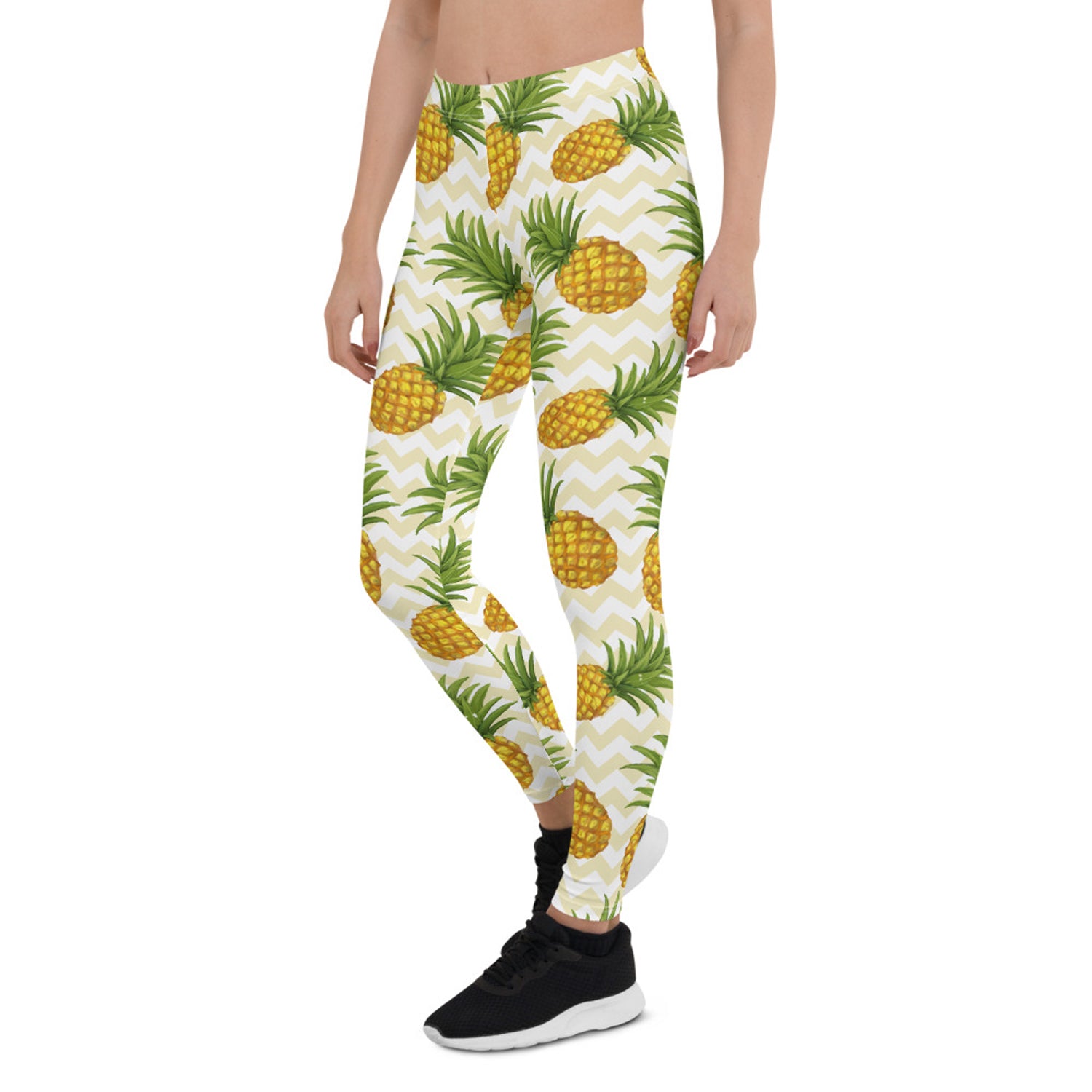 A pair of vibrant women's pineapple leggings featuring a unique graphic design, perfect for workouts and casual wear.