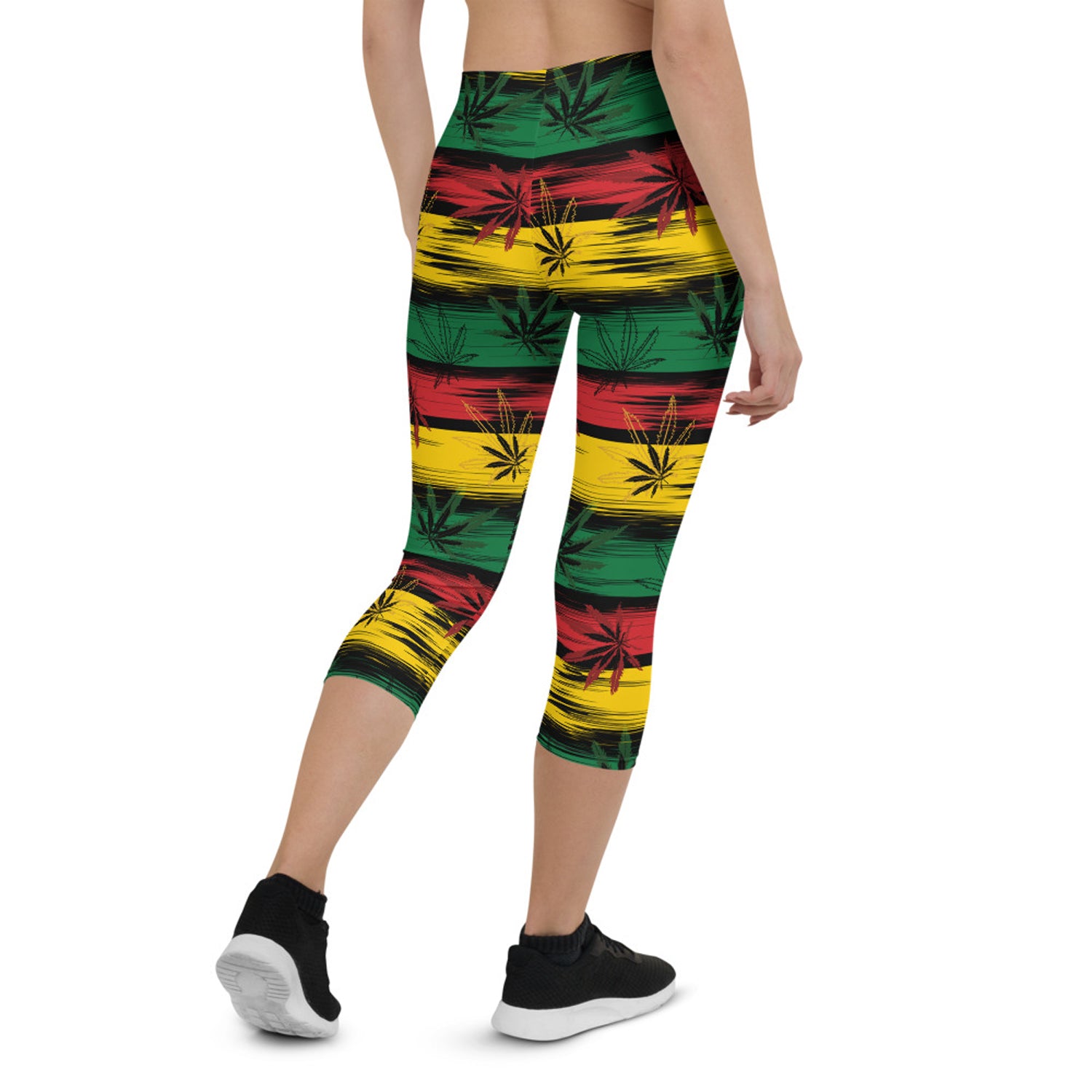 Womens Reggae and Cannabis Capri Leggings featuring vibrant colors and unique graphic designs, perfect for workouts and casual wear.