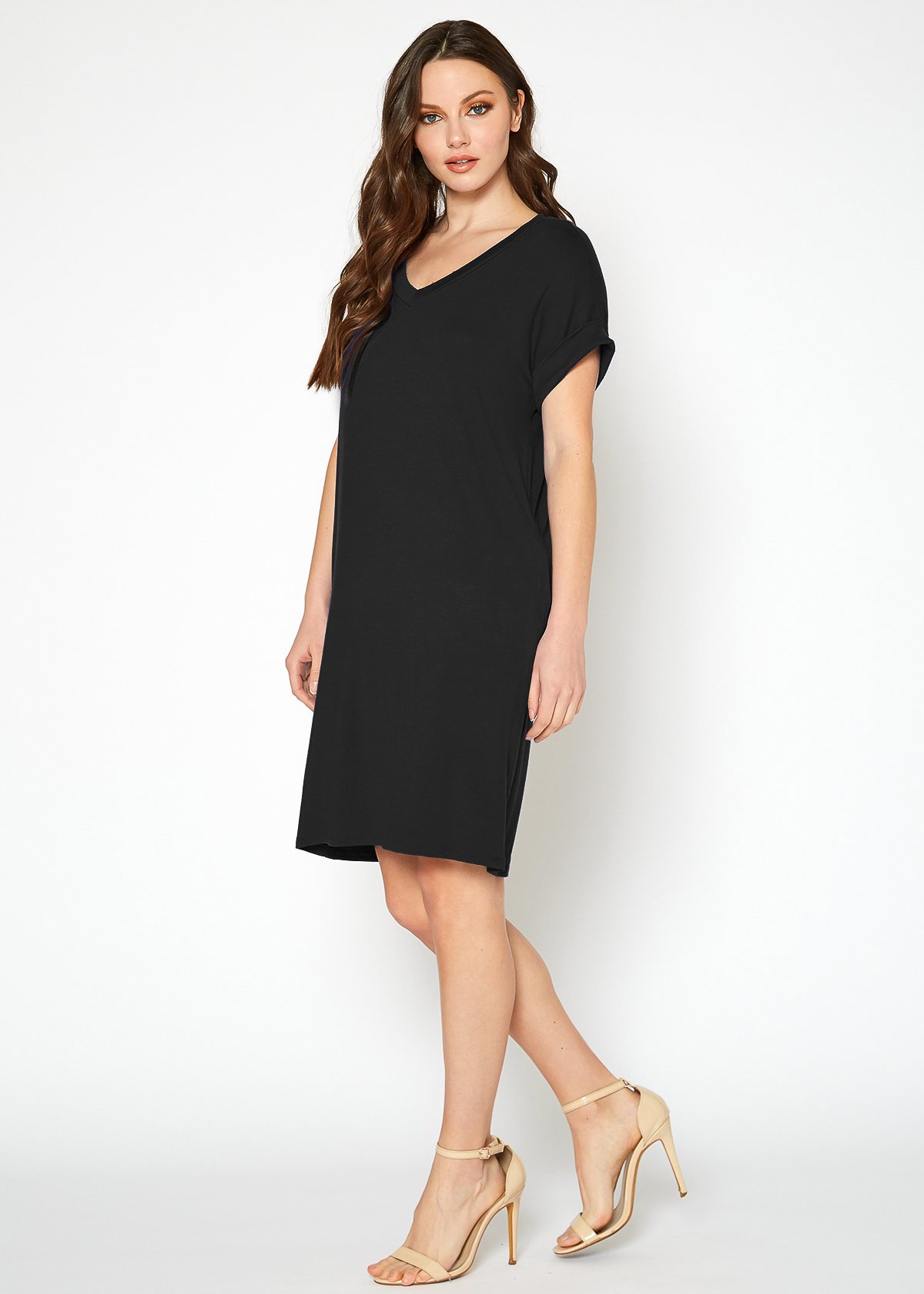 A stylish Women's Round Neck T-shirt Dress in a soft fabric, featuring a round neckline and convenient side pockets, perfect for casual wear.