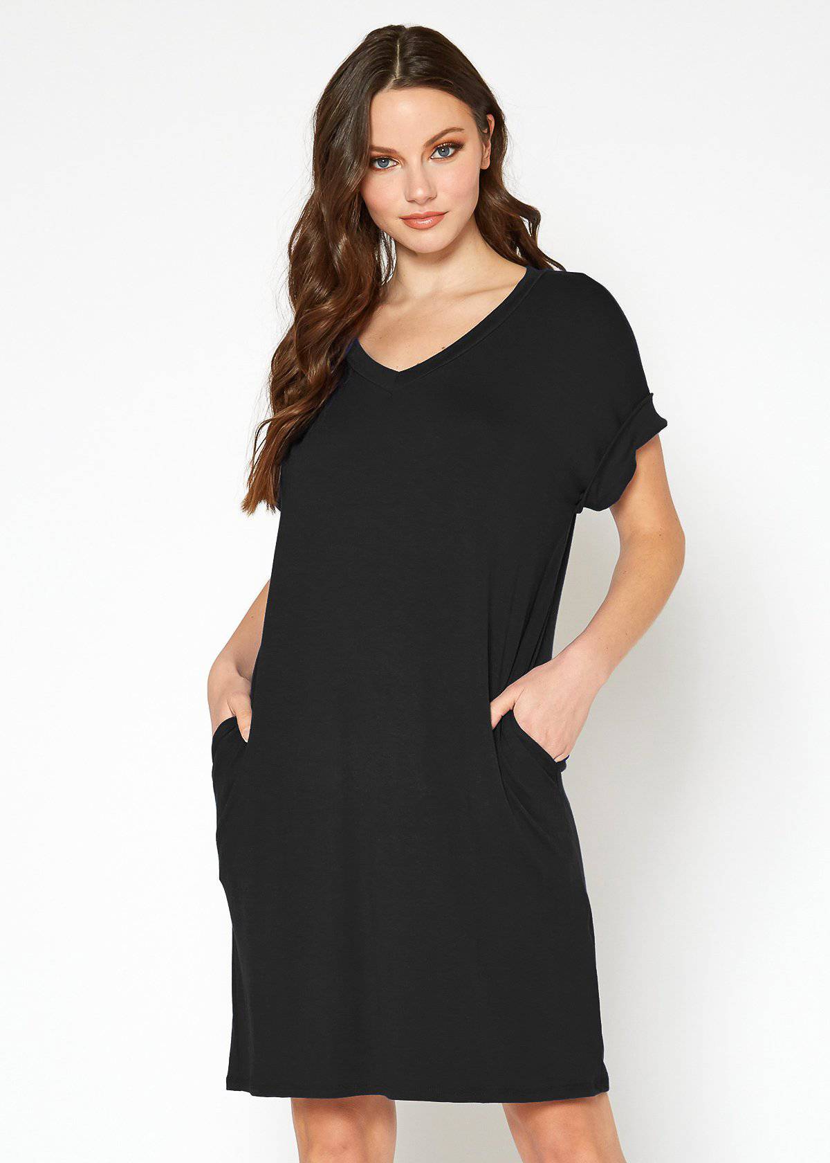 A stylish Women's Round Neck T-shirt Dress in a soft fabric, featuring a round neckline and convenient side pockets, perfect for casual wear.