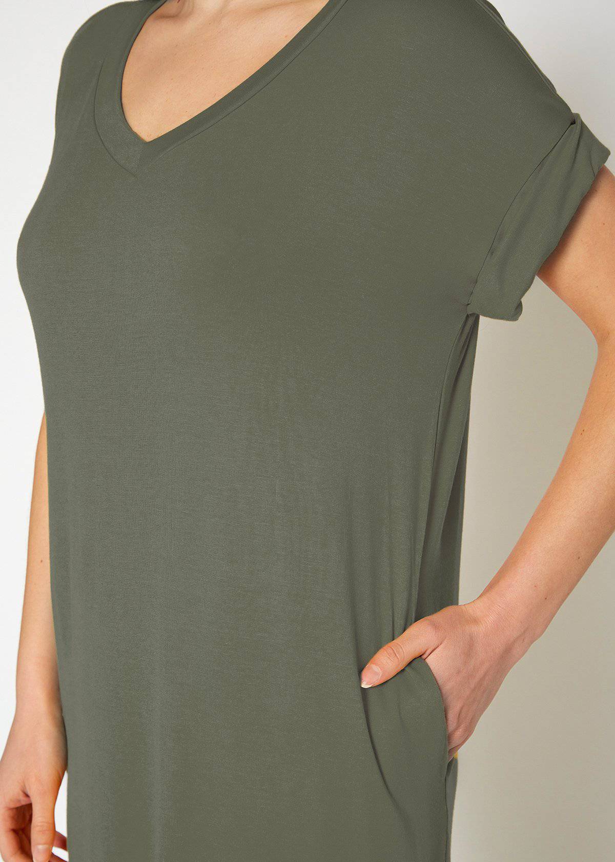 A stylish Women's Round Neck T-shirt Dress in a soft fabric, featuring a round neckline and convenient side pockets, perfect for casual wear.