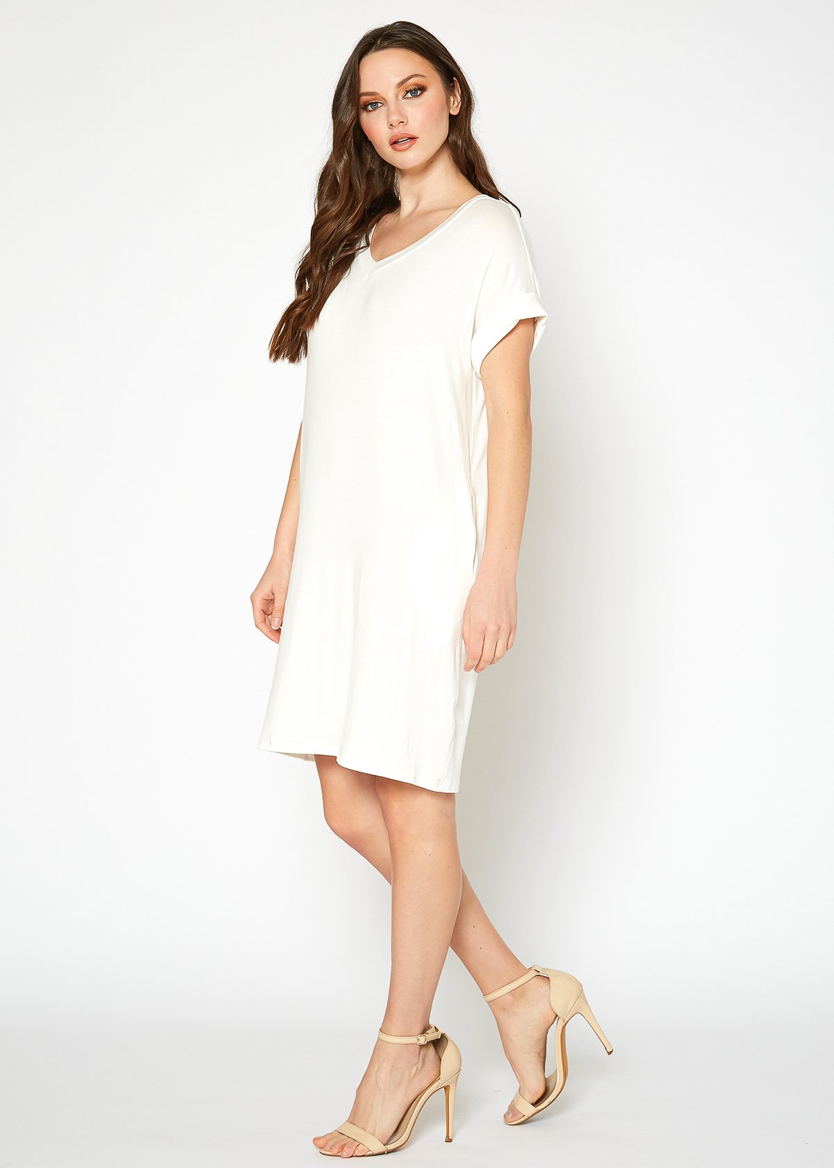 A stylish Women's Round Neck T-shirt Dress in a soft fabric, featuring a round neckline and convenient side pockets, perfect for casual wear.