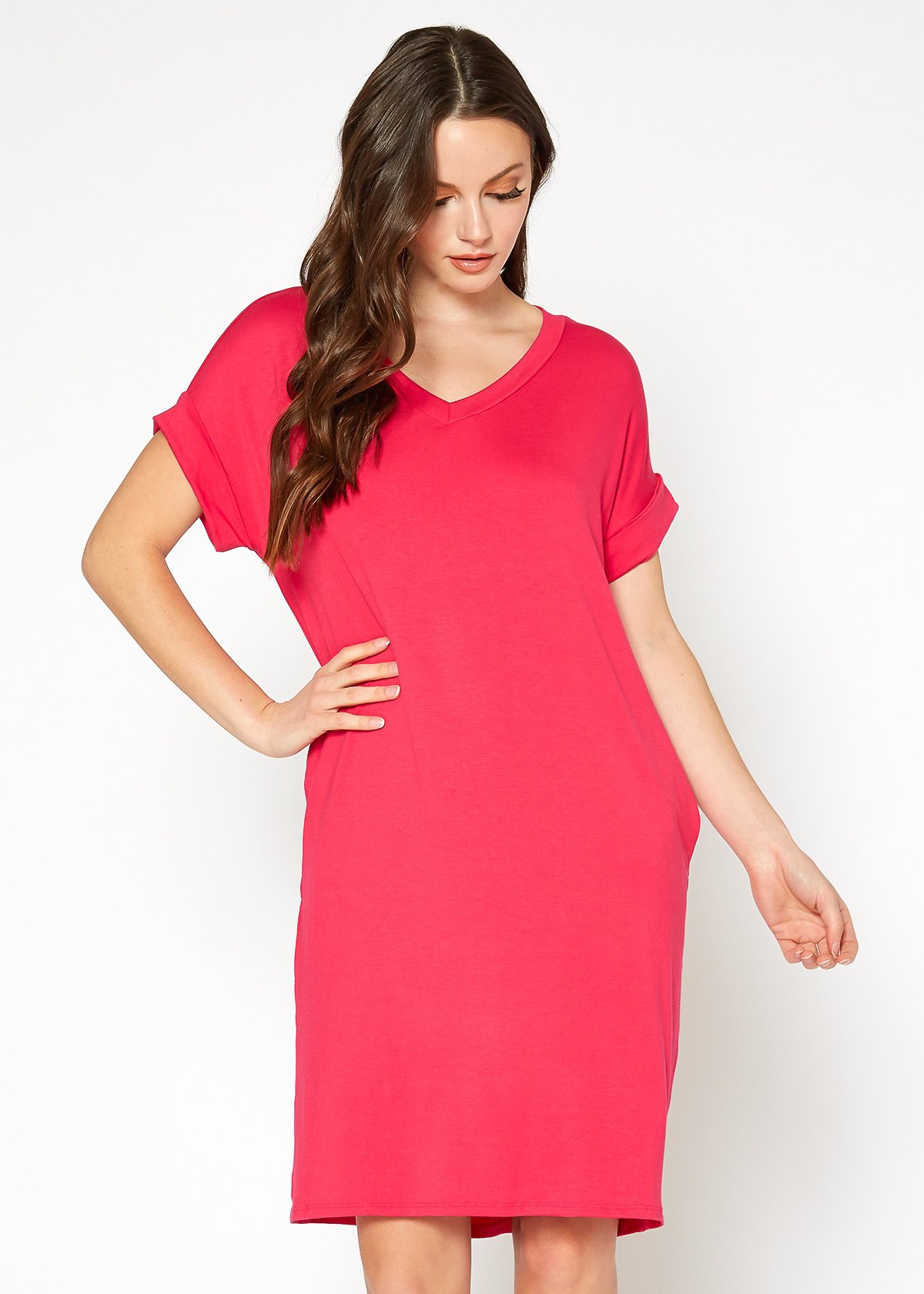 A stylish Women's Round Neck T-shirt Dress in a soft fabric, featuring a round neckline and convenient side pockets, perfect for casual wear.