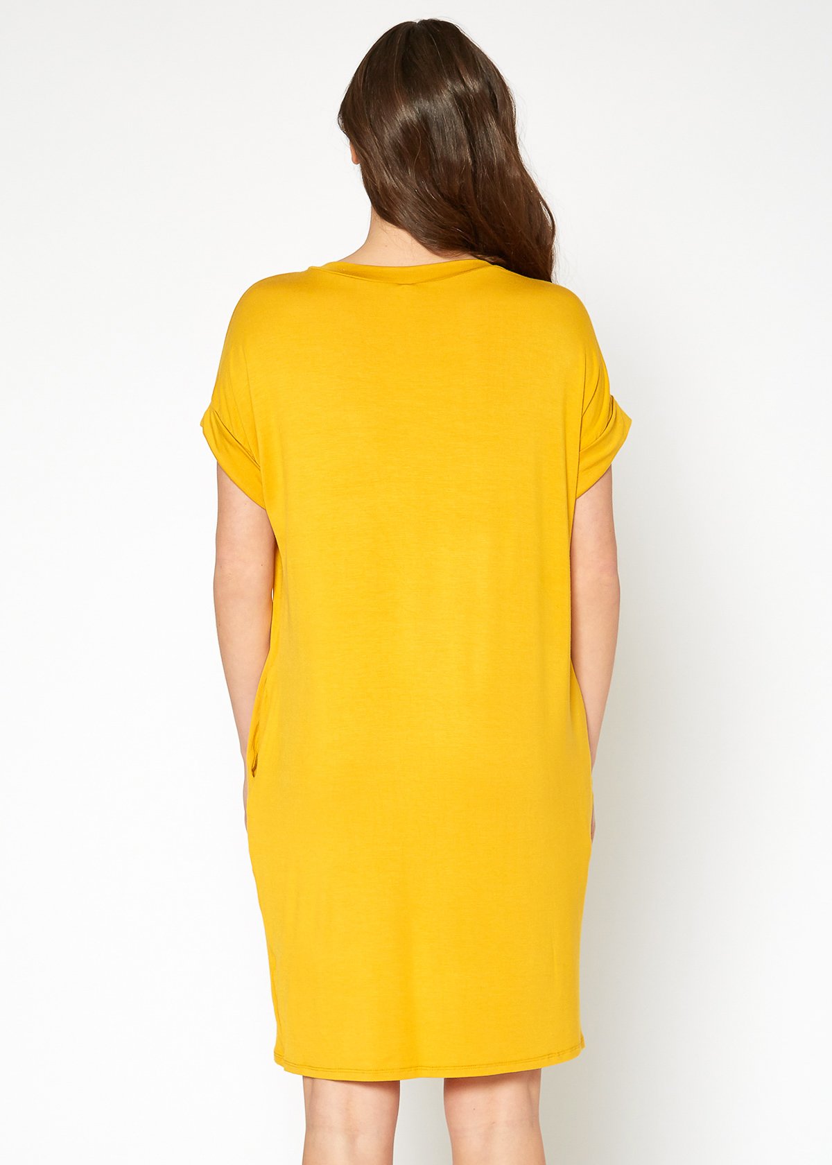 A stylish Women's Round Neck T-shirt Dress in a soft fabric, featuring a round neckline and convenient side pockets, perfect for casual wear.