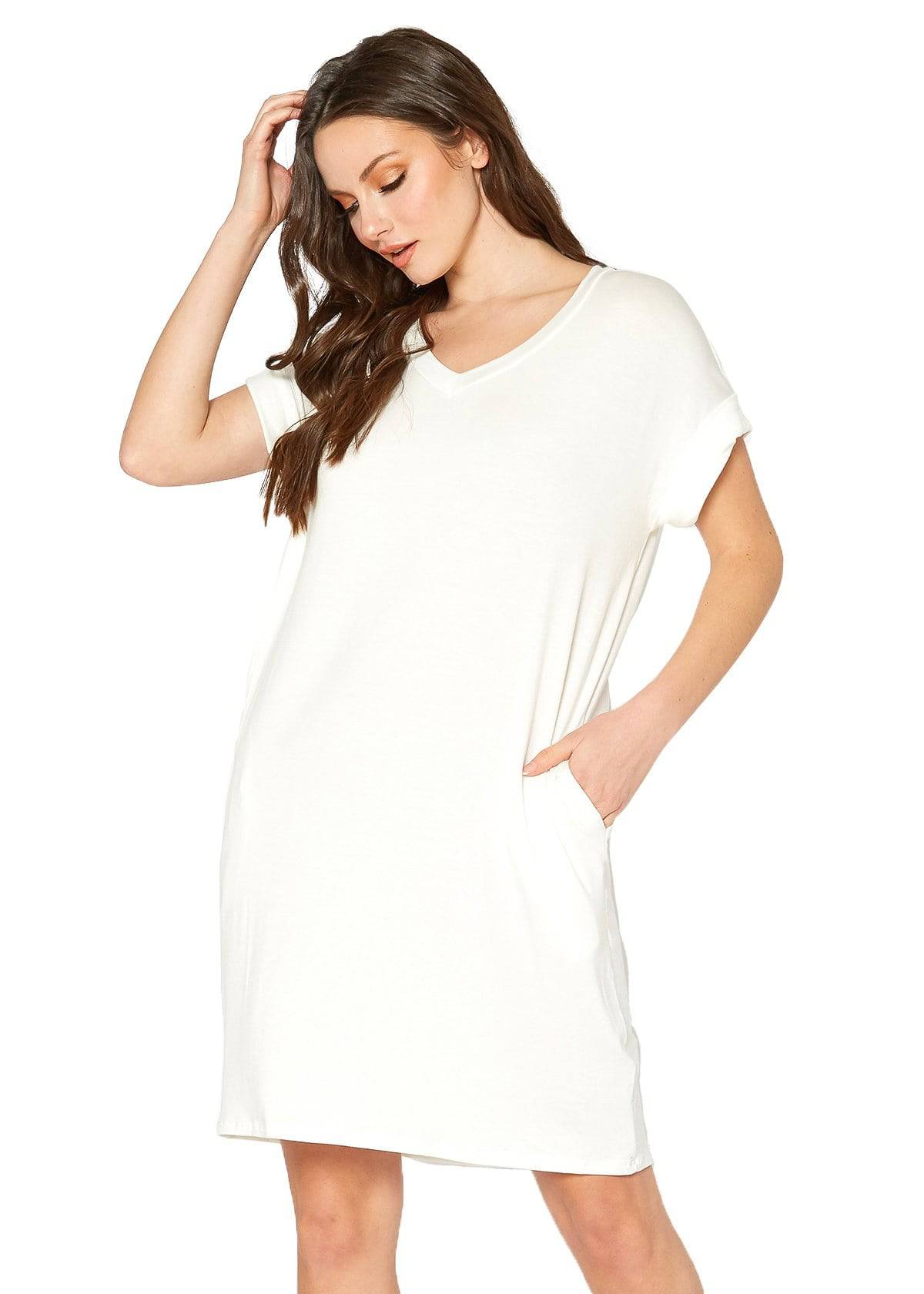 A stylish Women's Round Neck T-shirt Dress in a soft fabric, featuring a round neckline and convenient side pockets, perfect for casual wear.