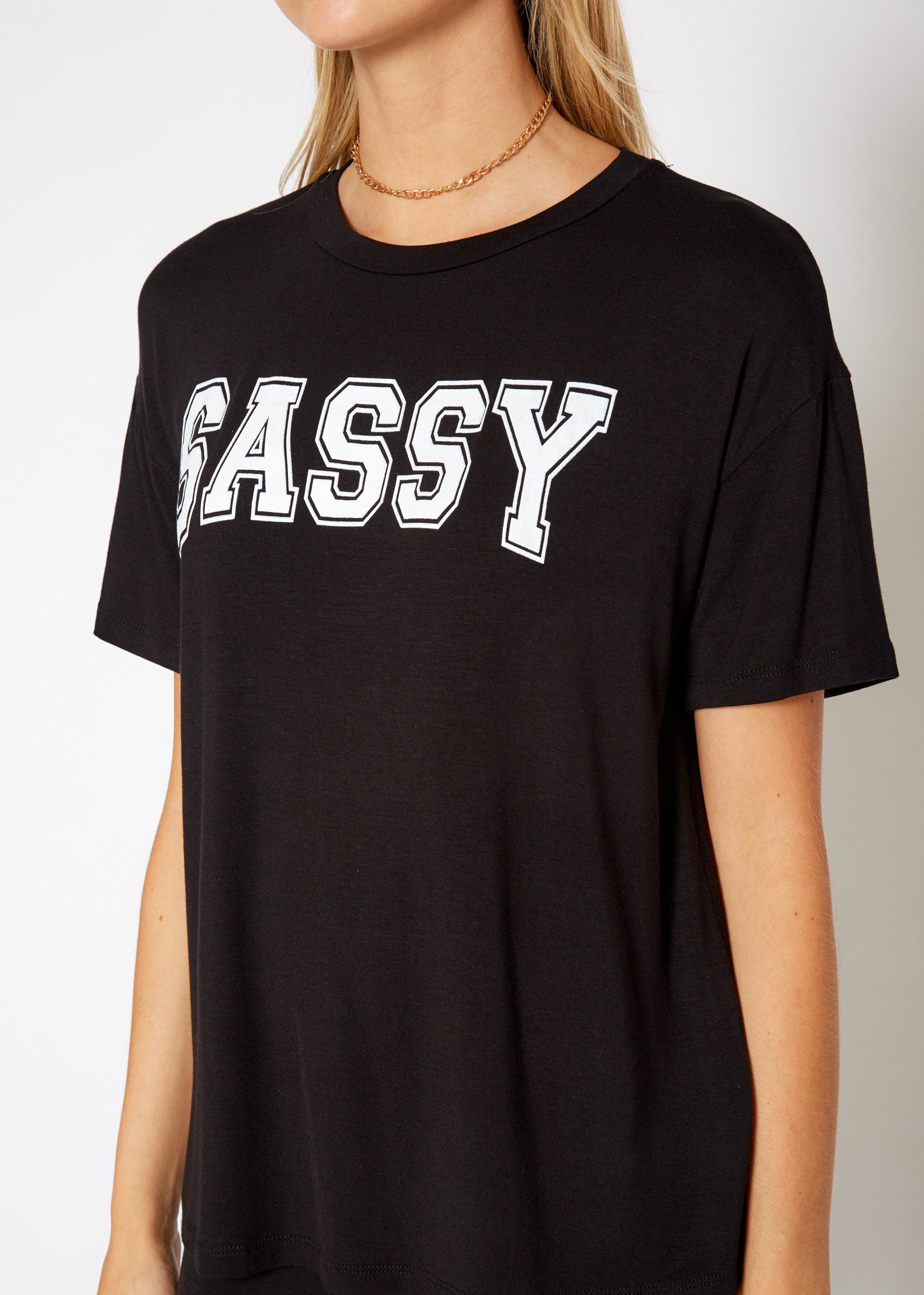 Women's Sassy Basic T-Shirt featuring a round neck, short sleeves, and a boxy fit, made from a soft rayon and spandex blend.