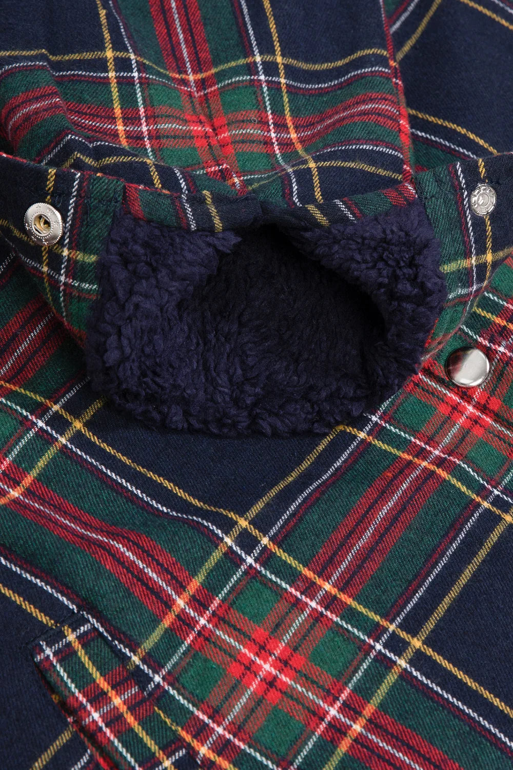 Women's Sherpa-Lined Flannel Jacket with Fleece Hood, featuring snap buttons and multiple pockets in a stylish plaid design.