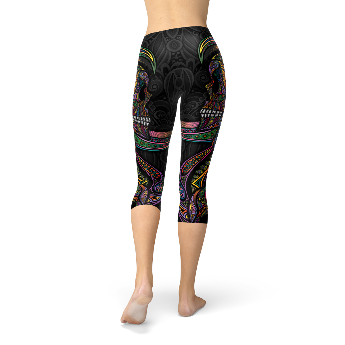 Womens Sugar Skull Capri Leggings featuring vibrant colors and intricate skull designs, perfect for workouts and casual wear.