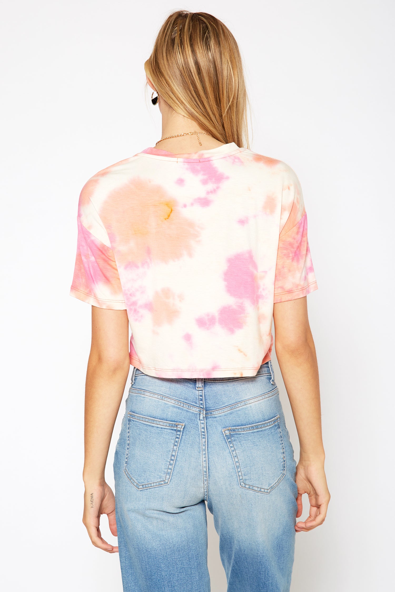 Women's 'Take it Easy' Printed Crop Top featuring a round neck and short sleeves, made from a soft rayon and spandex blend.